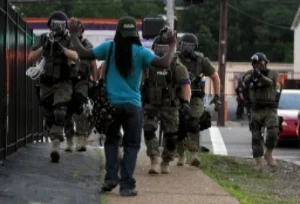 Protester in Ferguson, MO in August 2014 (photo by Jeff Robertson)