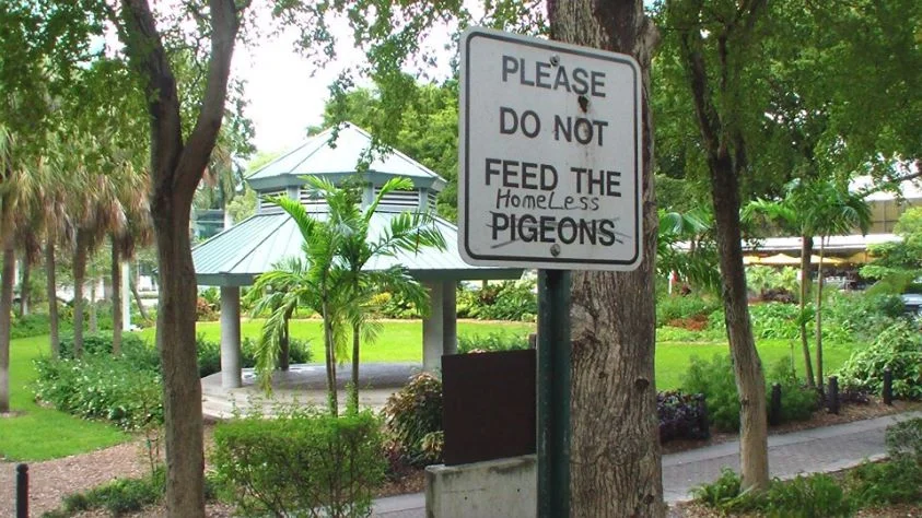Don't Feed the Homeless Sign at Stranahan Park