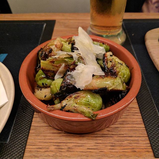 Tasty fresh from the pizza oven; roasted Brussels Sprouts. #littleballsoflove