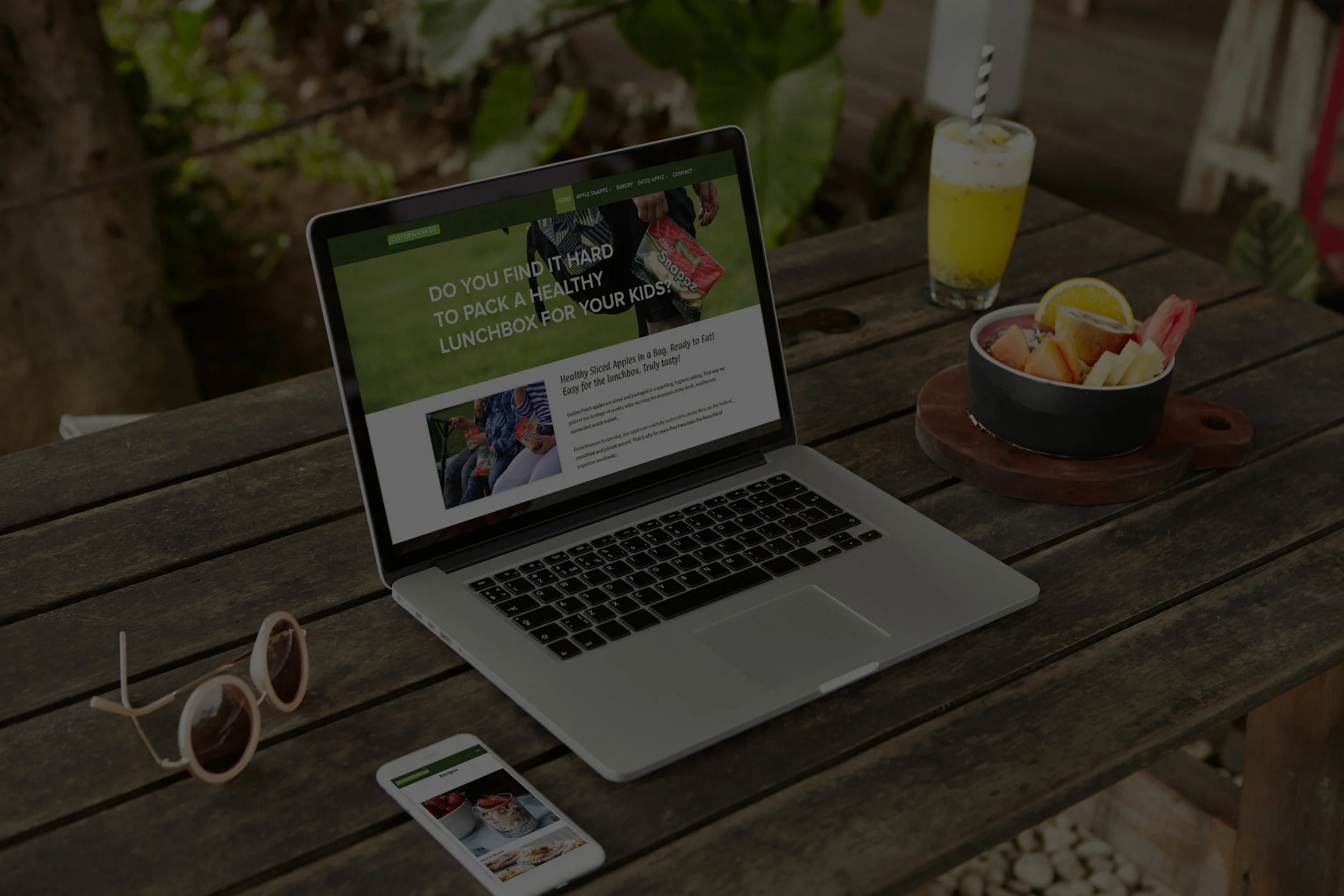 Smartphone With Laptop Mockup on Wooden Table dark.jpg