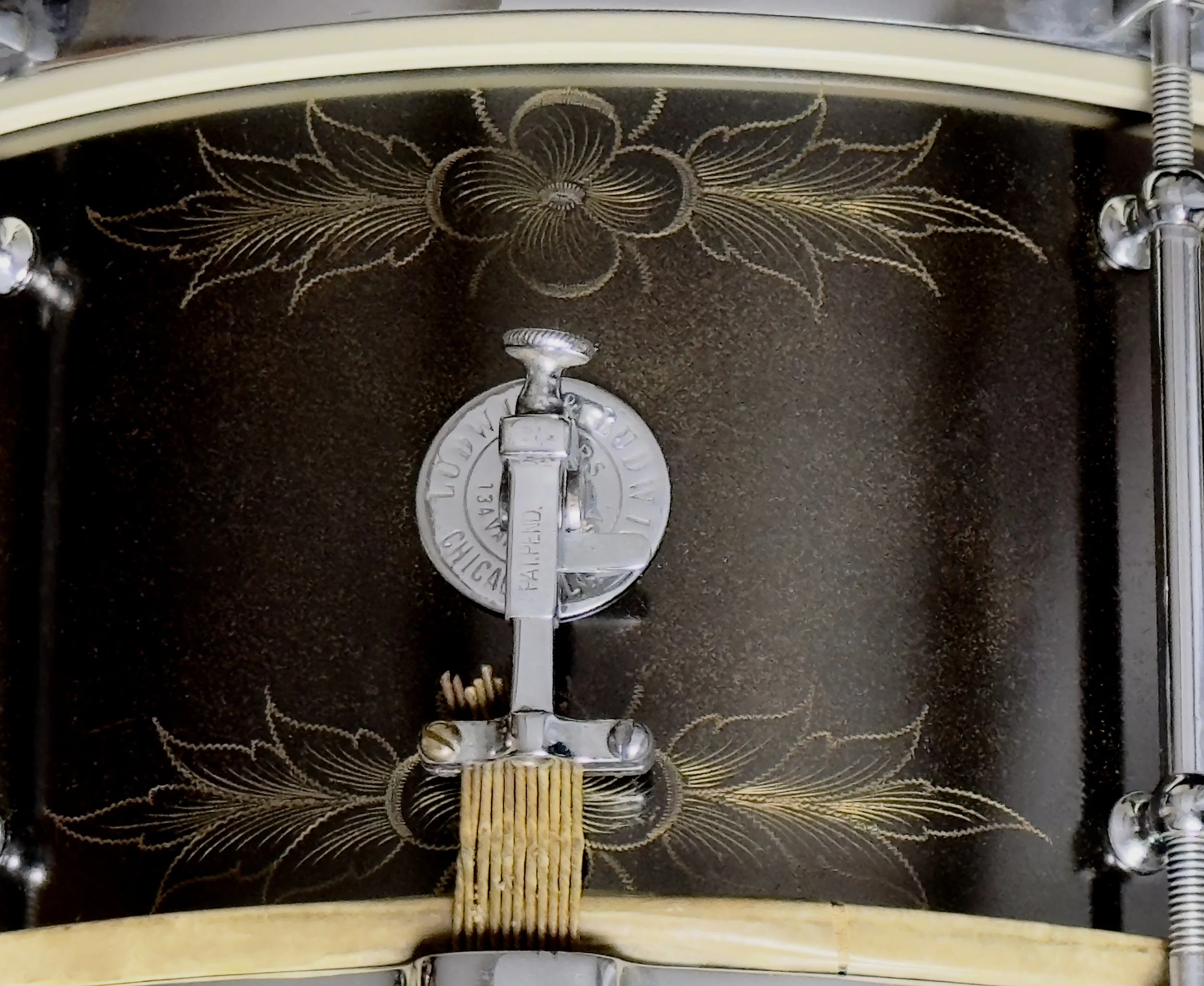 2. 1912_Engraved_Ludwig_badge_throw_close_sm.jpg