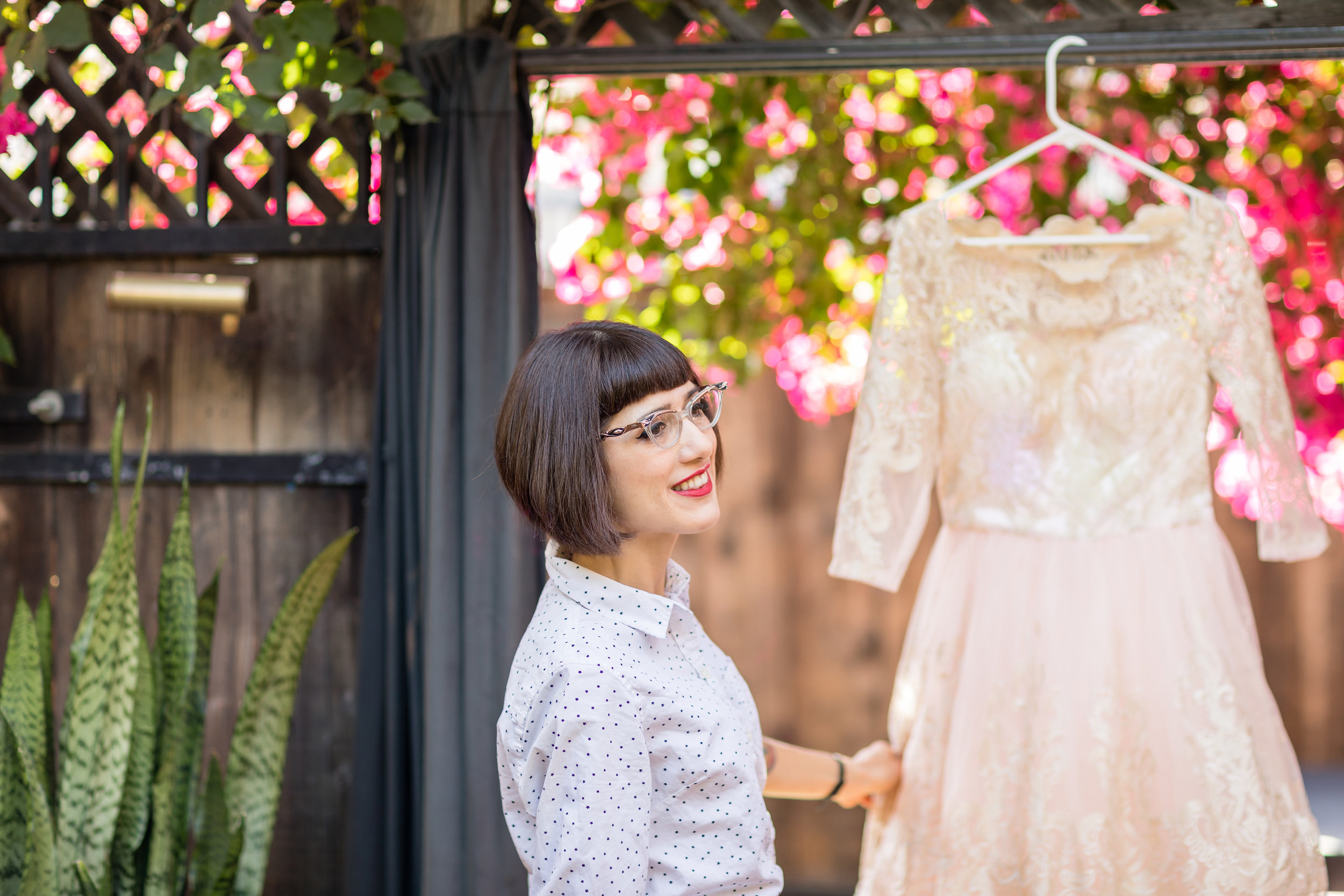 Julia admiring her dress by ModCloth