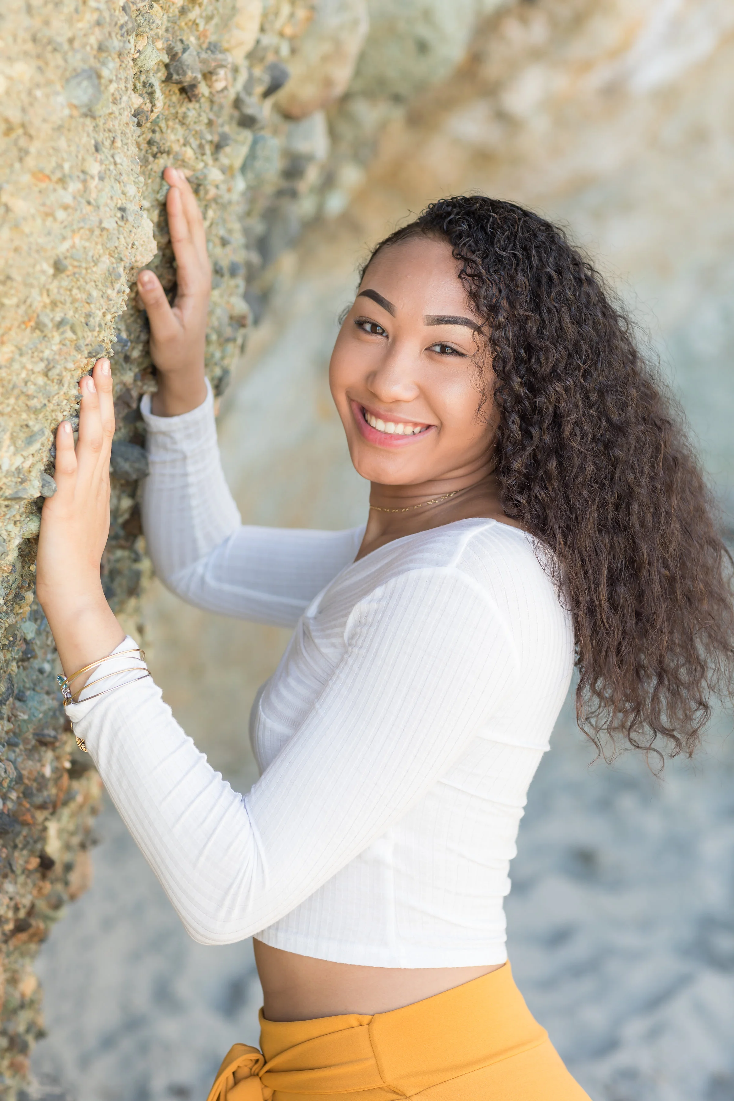 Happy Senior Against Rock Wall.jpg