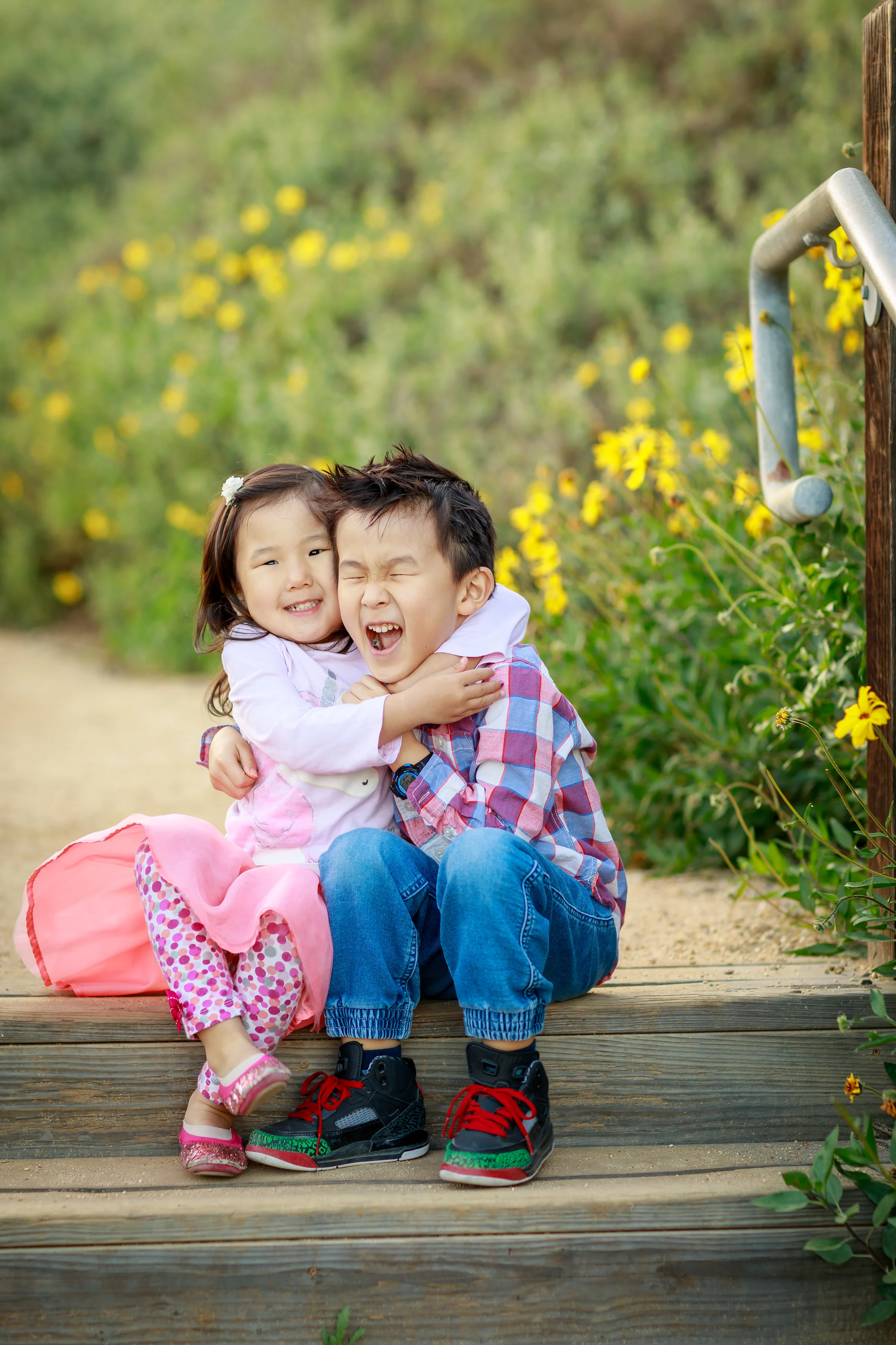 Sibling beach snuggles so cal.jpg