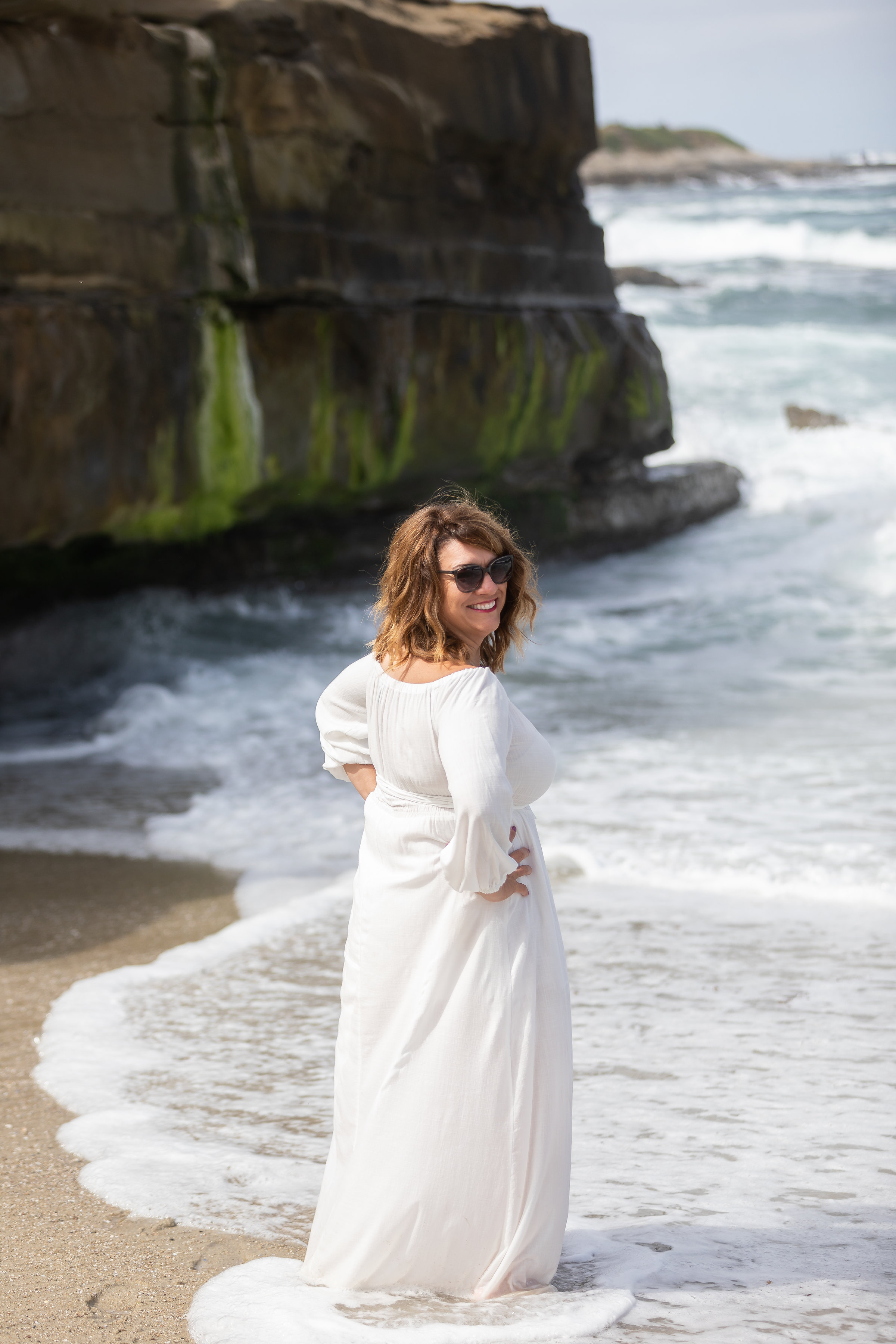 Mom looking cool in sunglasses on the beach.jpg