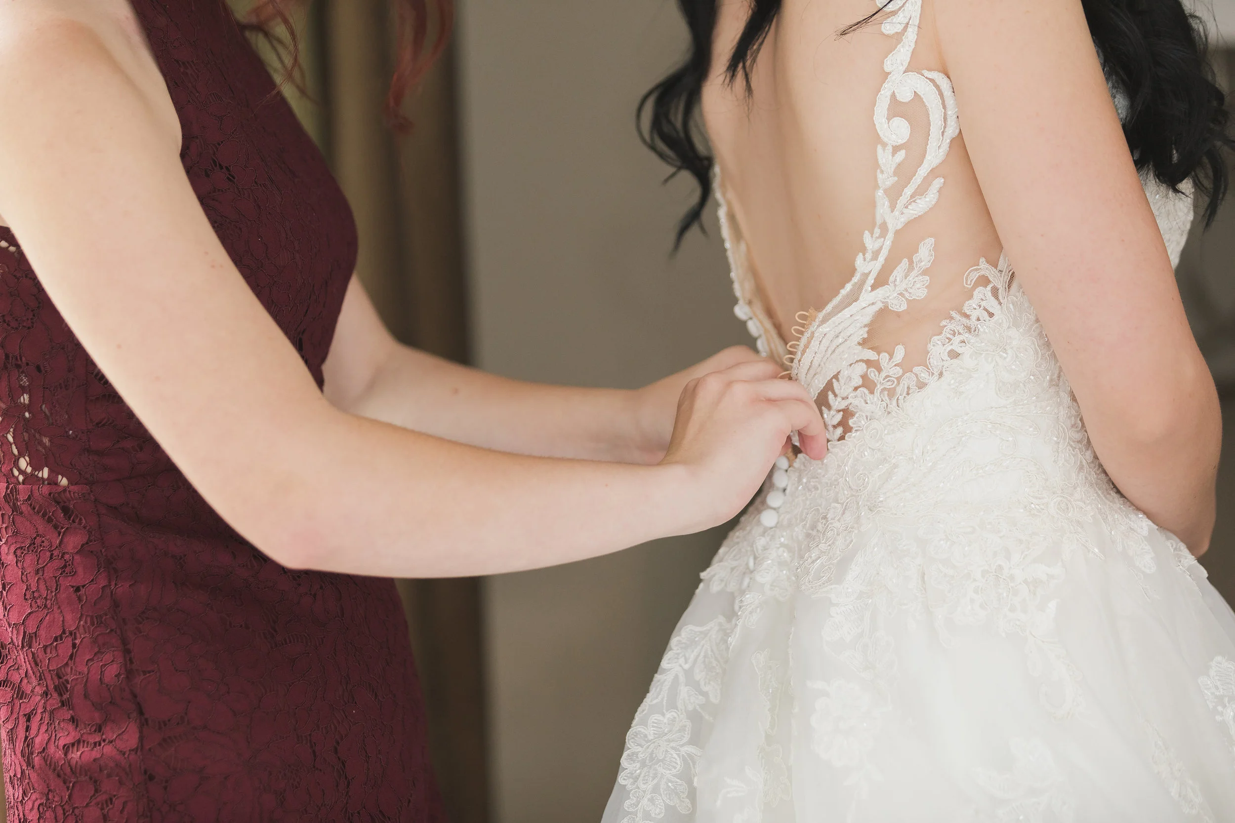Photo of Maid of Honor Assisting Bride.jpg