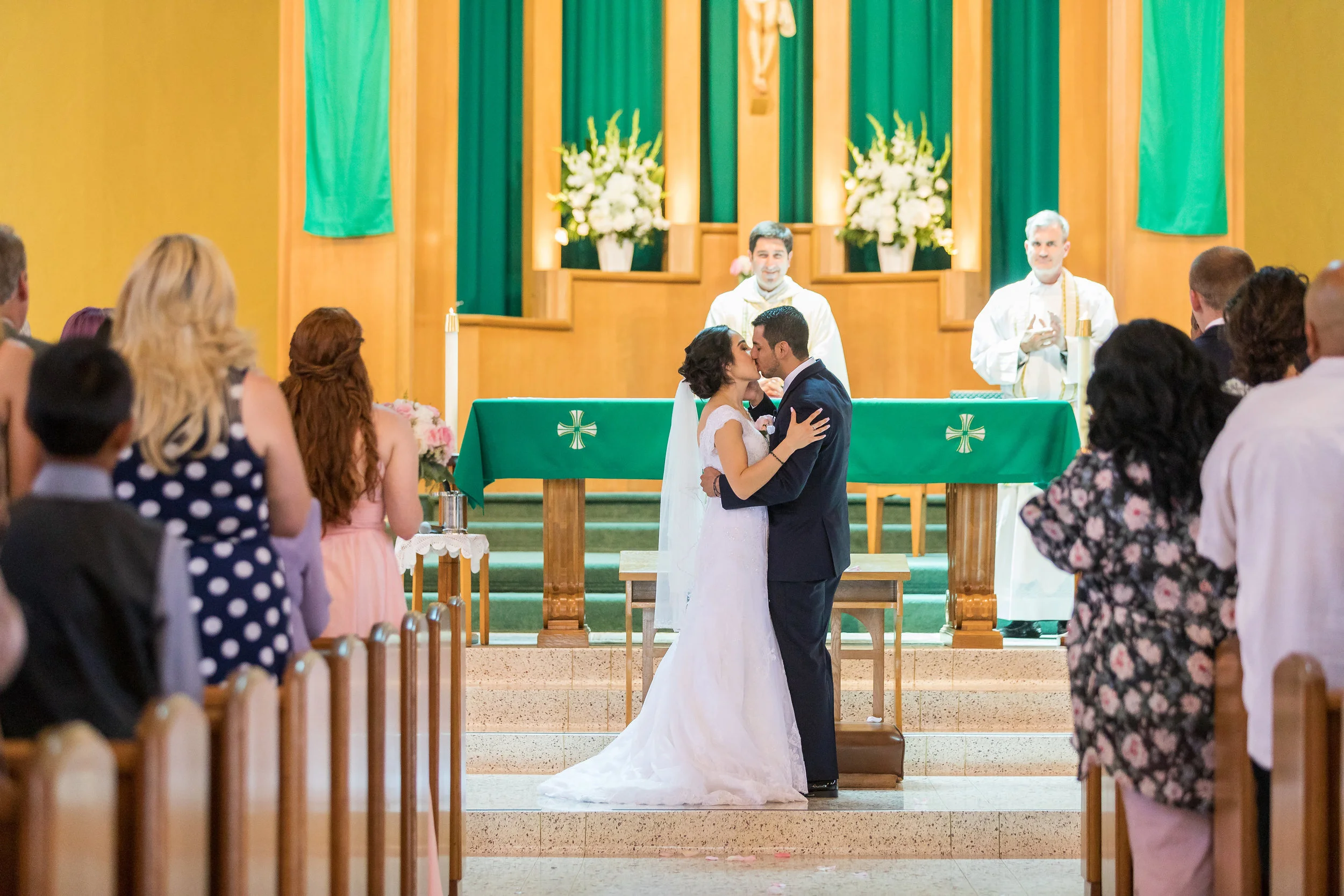 ! First Kiss as Husband and Wife in Catholic Church.jpg