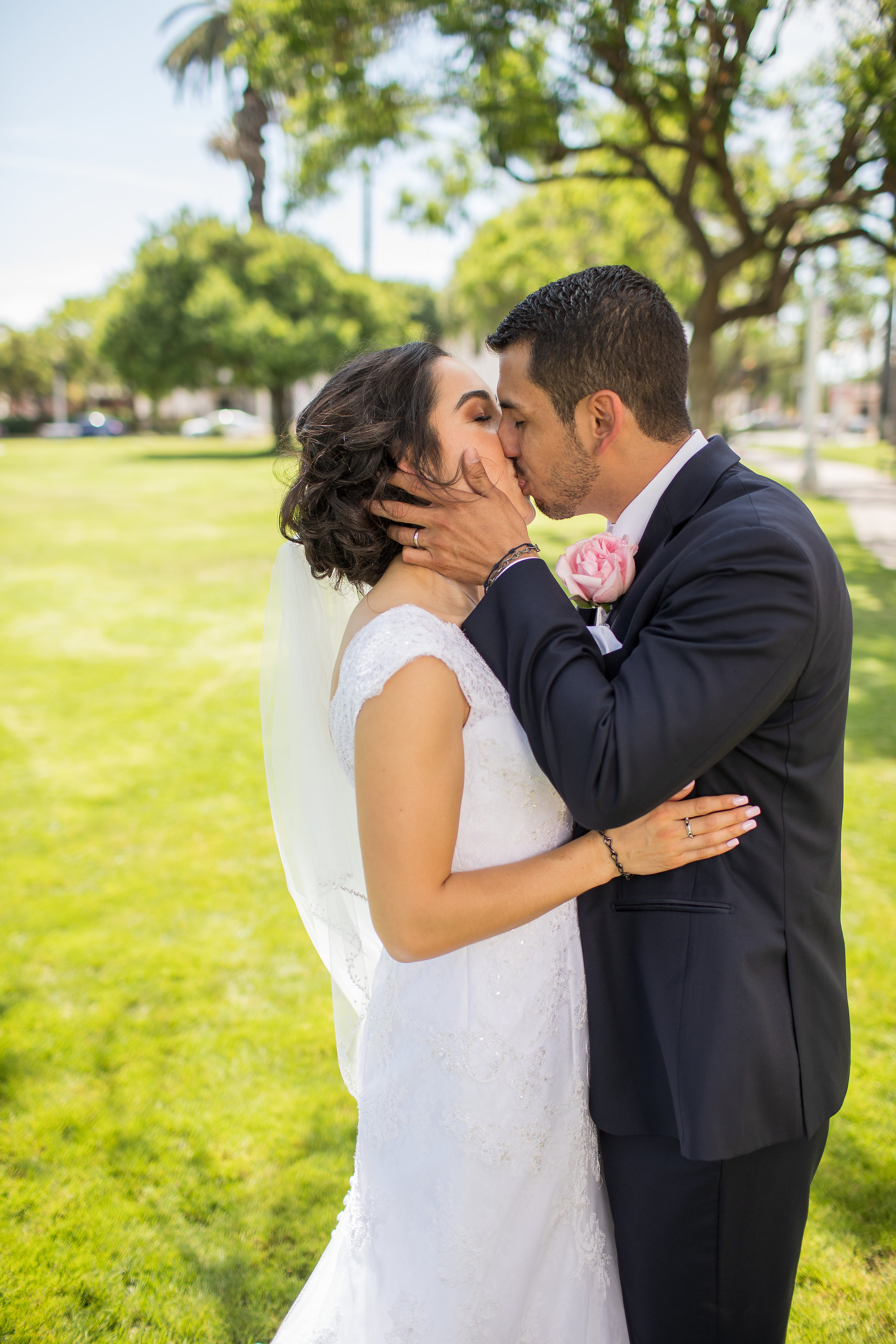 ! Bride and Groom Kissing in the Park.jpg