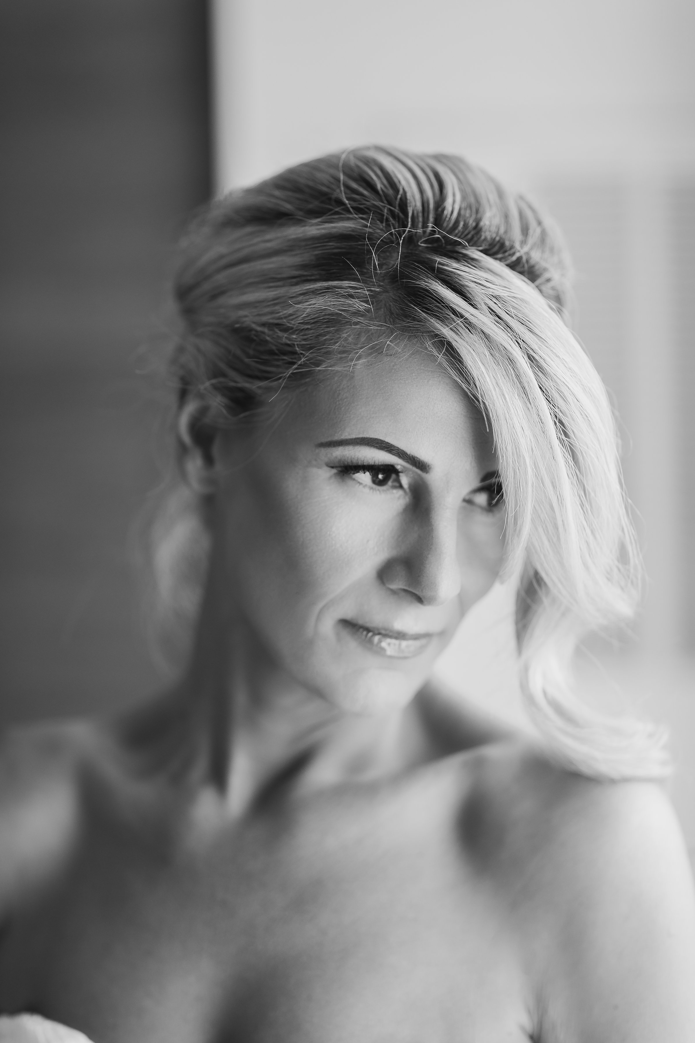 Bridal Portraits by the Window Getting Ready.jpg