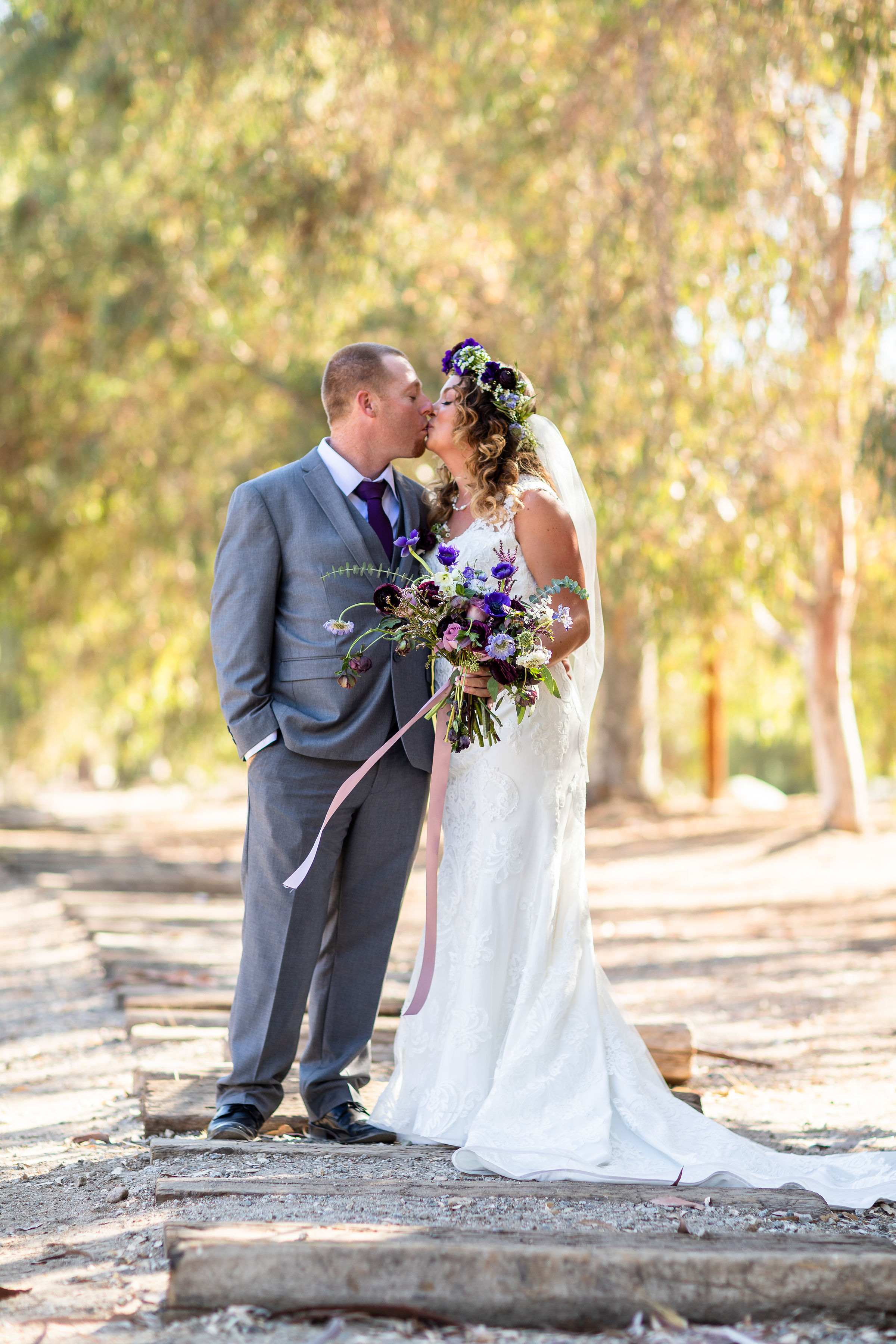 Bride and Groom Portraits on the train tracks Blomgren Ranch.jpg