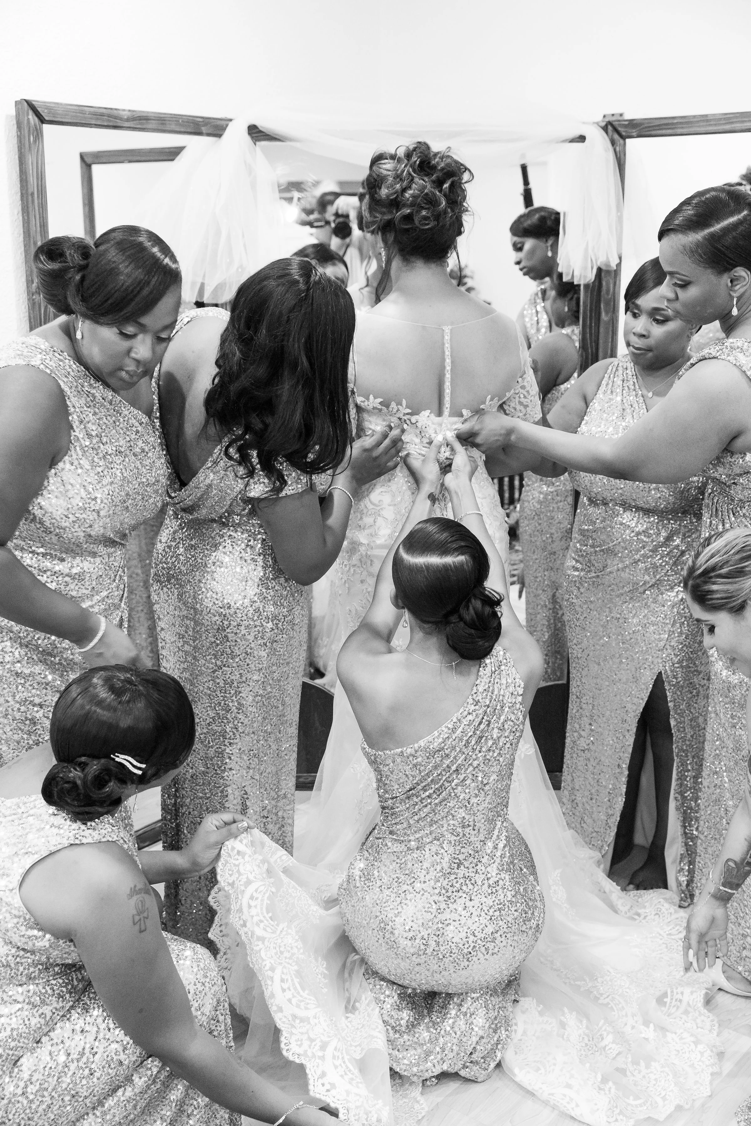 ! Bridesmaids helping Bride into Dress Wedding Getting Ready Photos.jpg