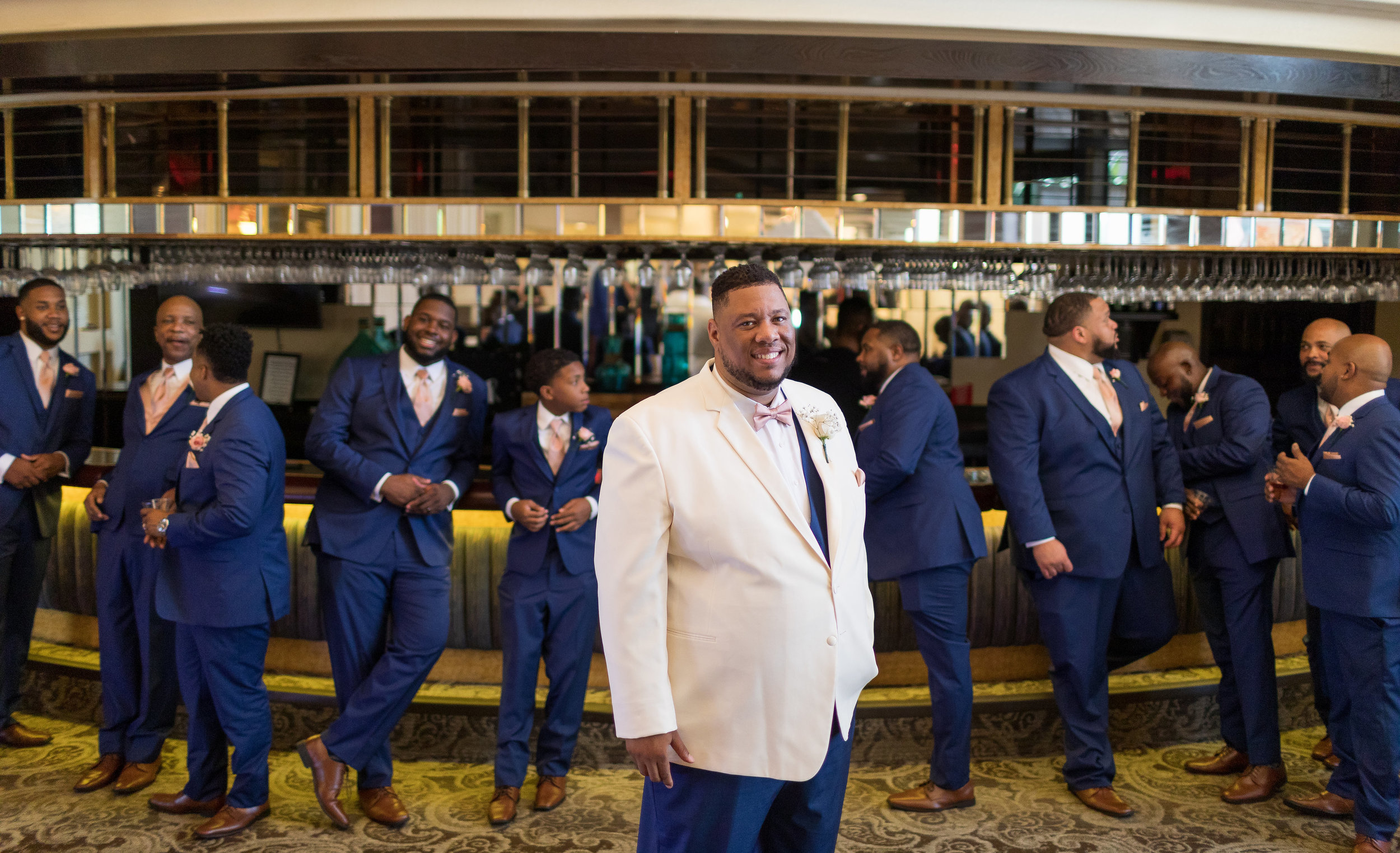 ! Groom in White Tux + Groomsmen in Blue Suits.jpg