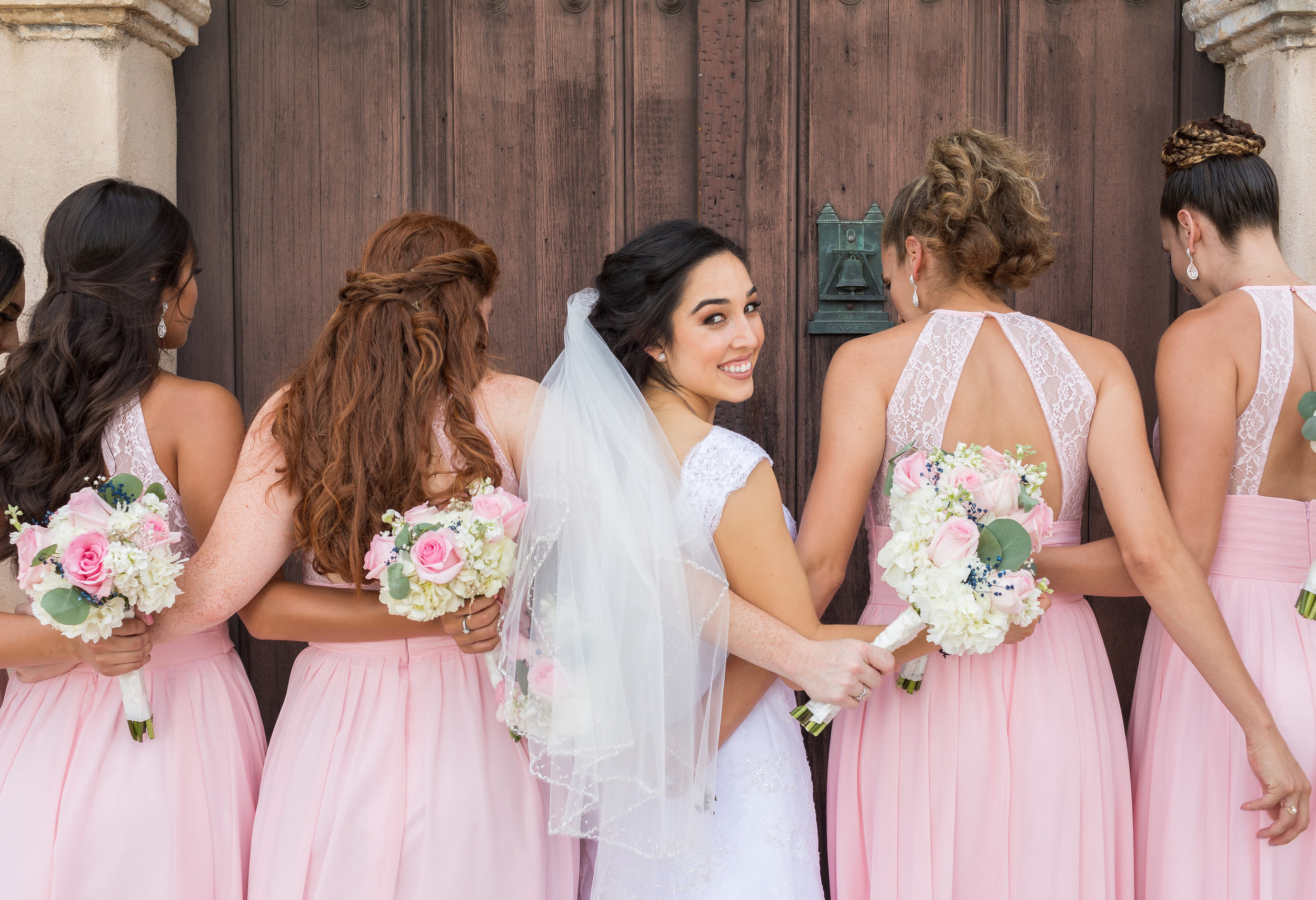 ! Close up photo of Bride with her Bridesmaids.jpg