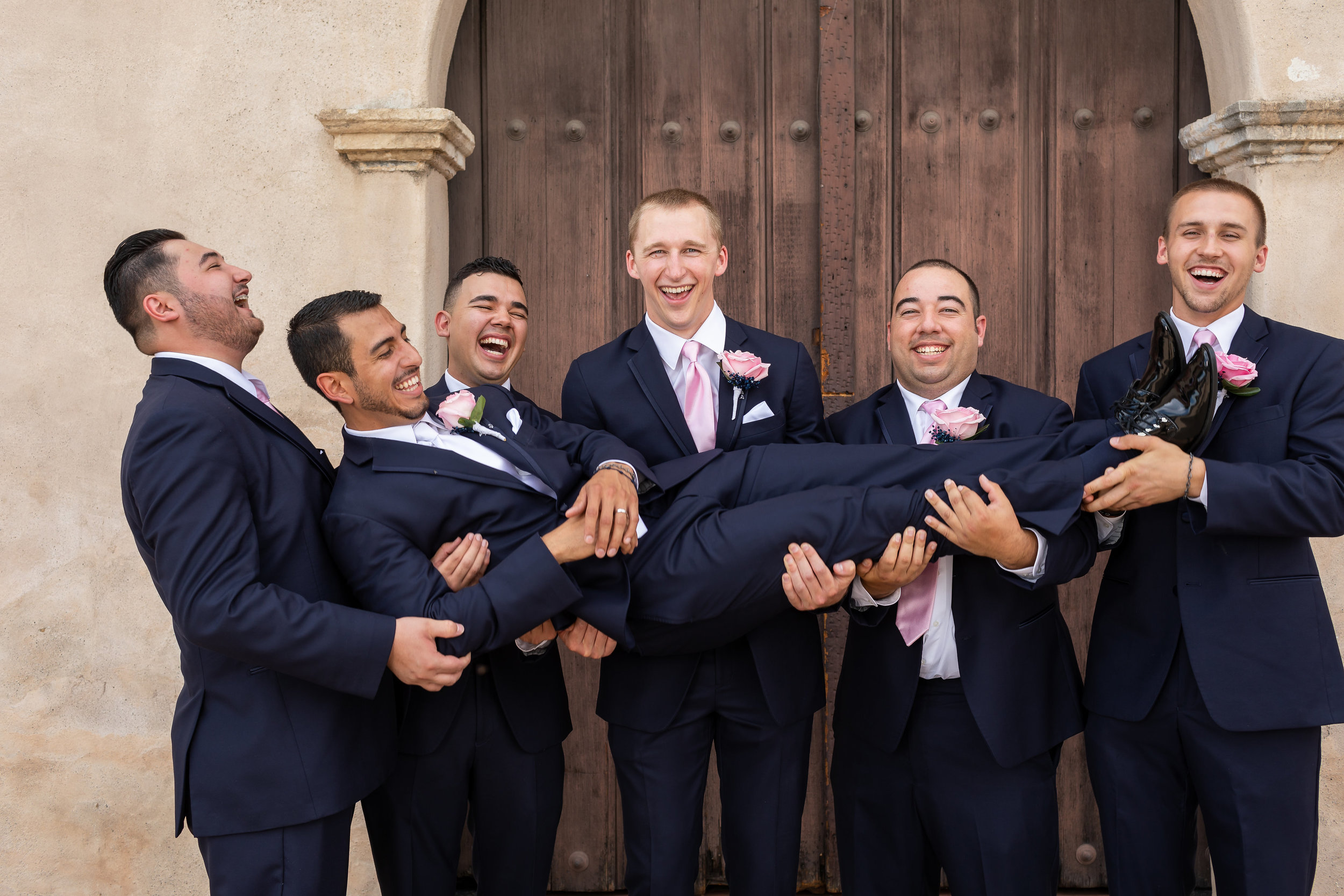 ! Groomsmen carry Groom.jpg