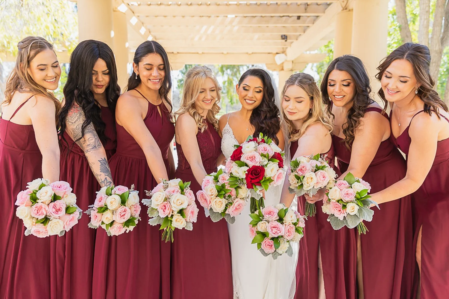 Bridesmaids with flower bouquets