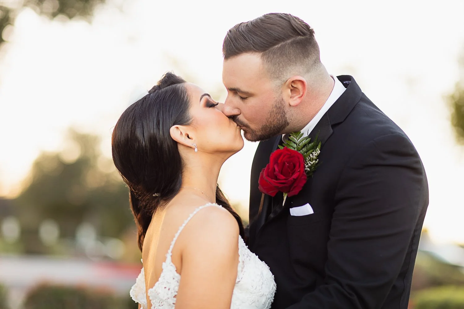 Bride and Groom sharing a kiss