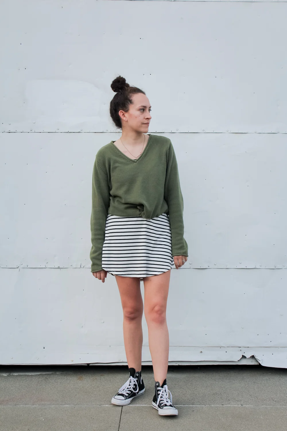 Day 4 of the Spring 10x10/Unfancy Remix challenge! I wore a light green v neck sweater over a stripe t shirt dress and styled it with a top knot and my high top converse sneakers