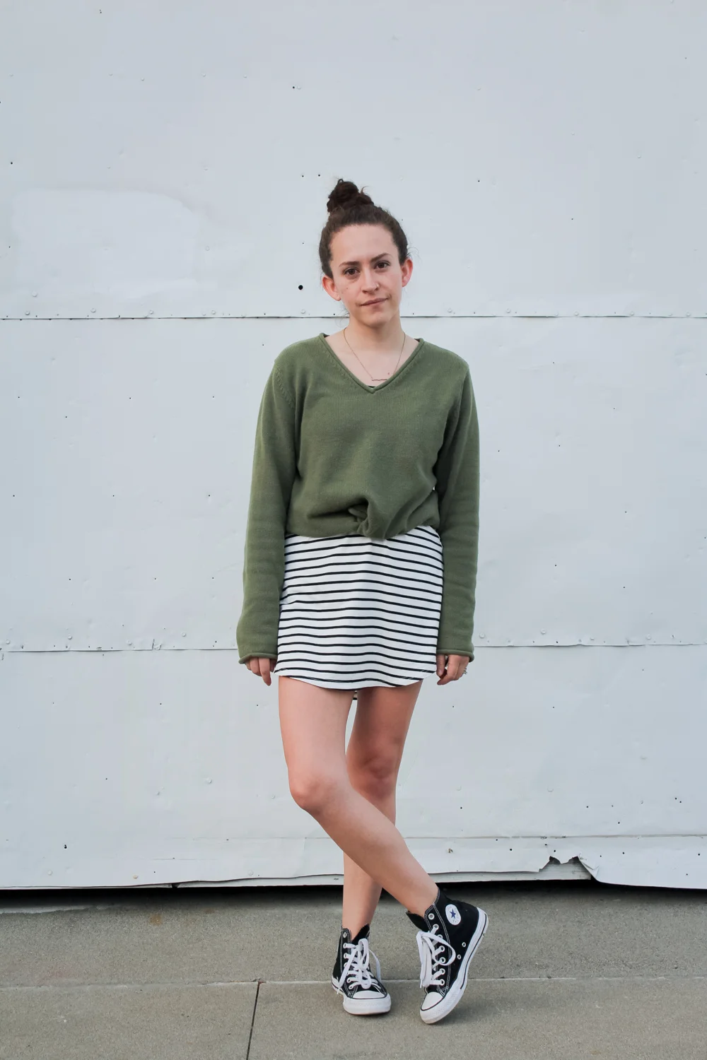 Day 4 of the Spring 10x10/Unfancy Remix challenge! I wore a light green v neck sweater over a stripe t shirt dress and styled it with a top knot and my high top converse sneakers