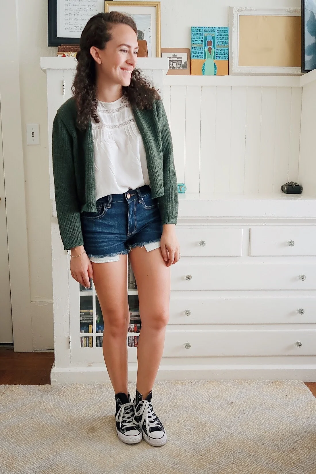 my mid-season mini haul included these dark wash high rise denim shorts from american eagle. so comfy and so easy to wear. styled with a white flowy blouse, black high top converse, and my thrifted olive green cropped cardigan. kinda perfect for back to school.