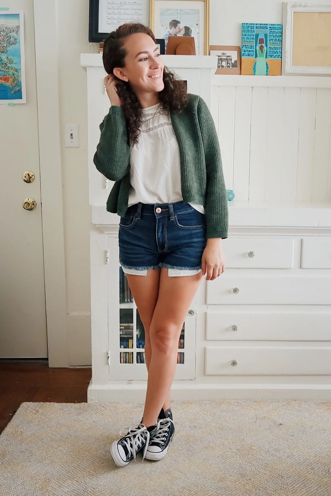 my mid-season mini haul included these dark wash high rise denim shorts from american eagle. so comfy and so easy to wear. styled with a white flowy blouse, black high top converse, and my thrifted olive green cropped cardigan. kinda perfect for back to school.
