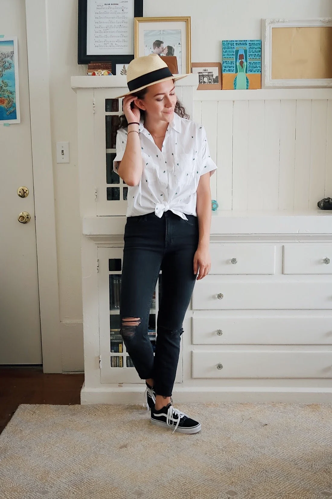 my mid-season mini haul included this cactus embroidered button up shirt from madewell. it's a perfectly subtle pattern for someone who likes simple clothes (like me). Styled with my black high rise distressed jeans, also from madewell, my low top old skool vans and a straw fedora.