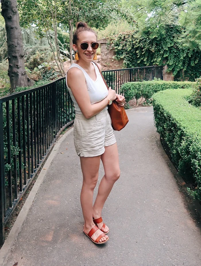 10 items 10 ways, 10 items 10 outfits, 10 items 10 days, 10 pieces 10 outfits, 10x10 challenge | wearing white Gap tank top, beige tan cotton shorts, #madewell sunglasses, and #fossil hybrid smartwatch | tinted-green.com