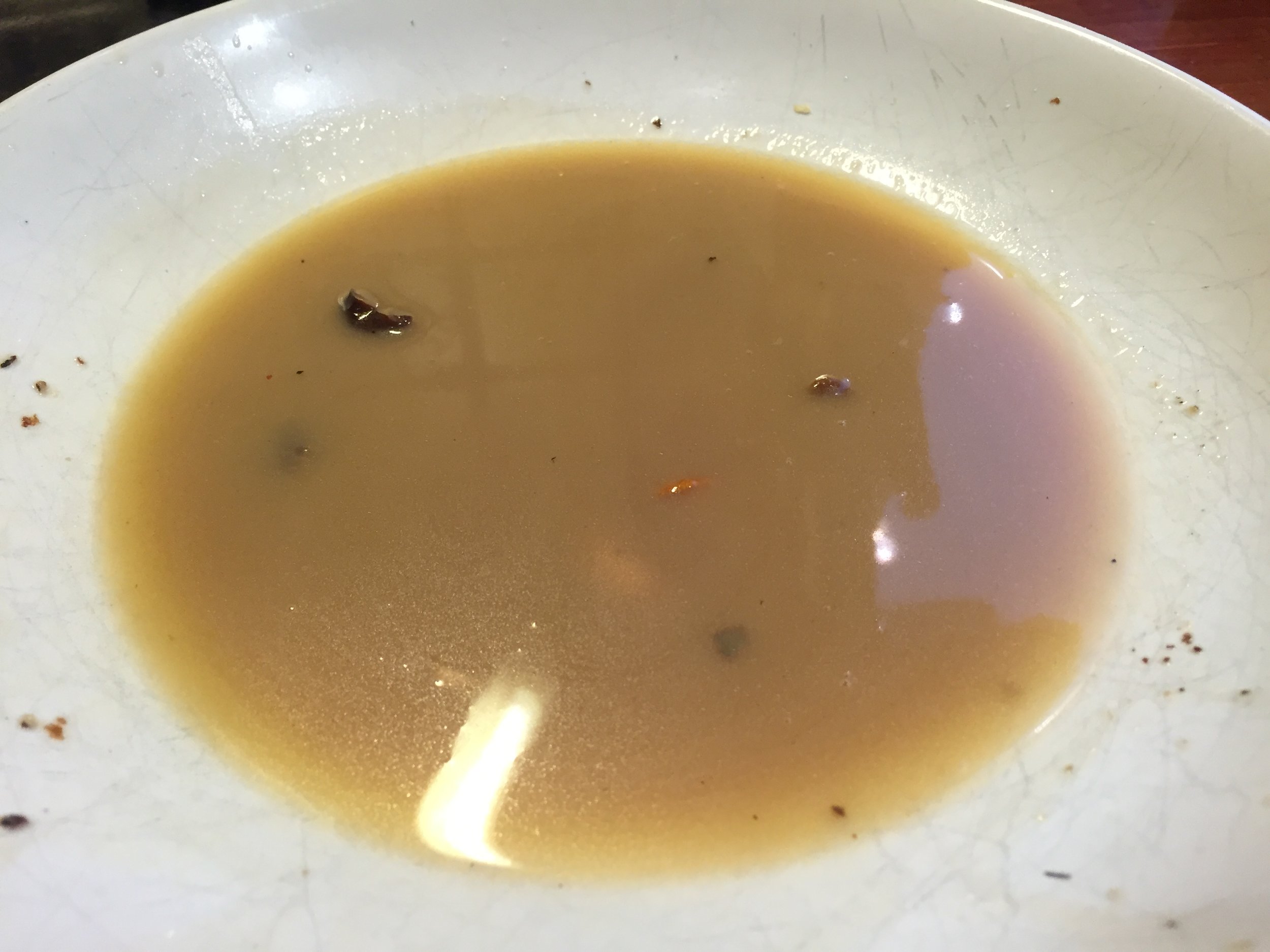 The butter and mushroom stock, drained from the pan after frying for approximately 3 minutes on a high heat