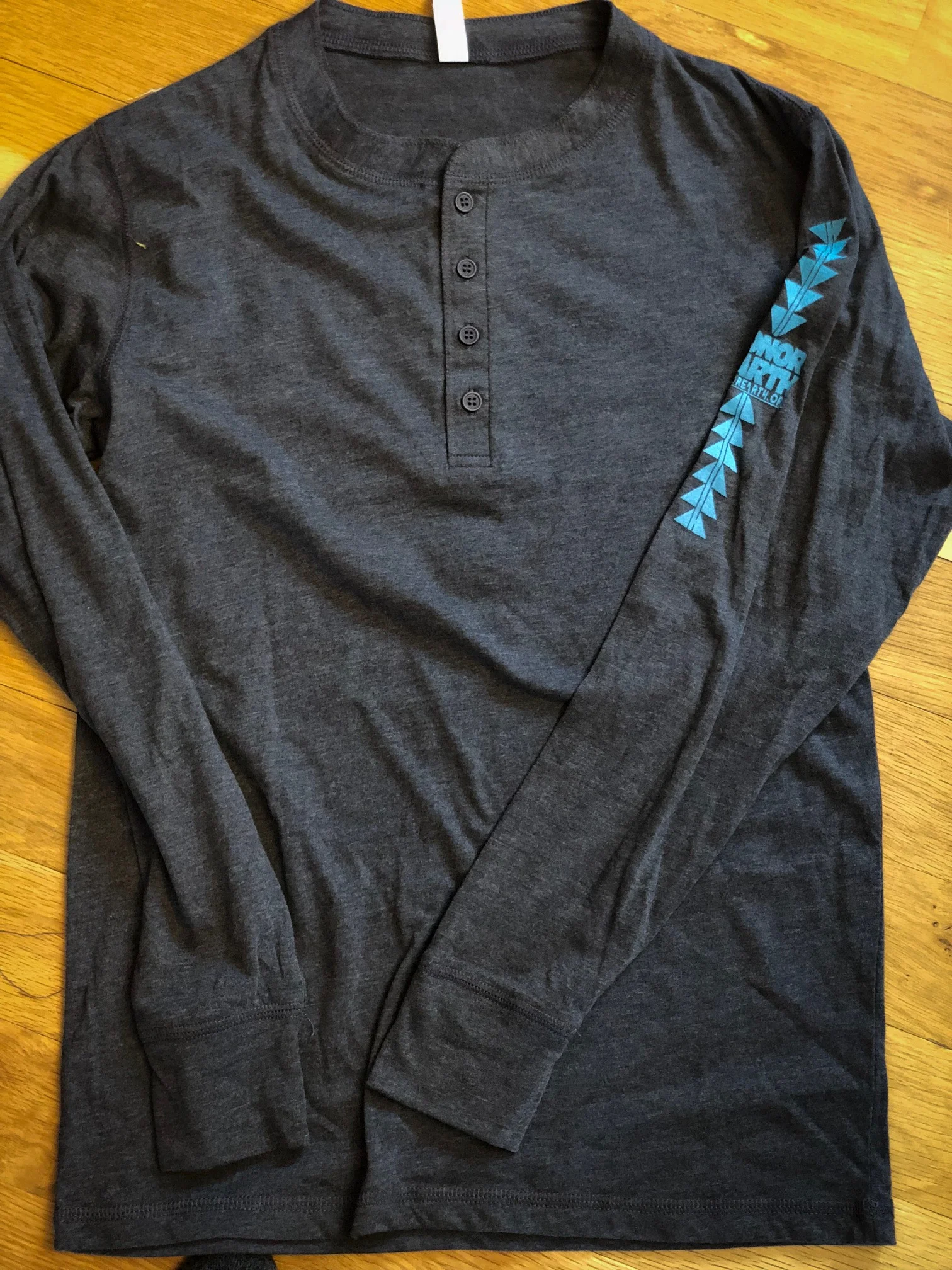 "Water is Sacred" Unisex Long Sleeve Jersey by Christi Belcourt