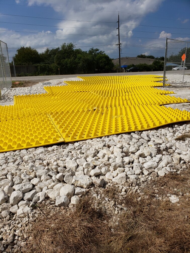 Trackout-Control-System-On-Texas-Manufacturing-Plant_Reusable-Construction-Entrance-Mat_TxDOT-Effective-Stormwater-Erosion-And-Sediment-Control-System.jpg
