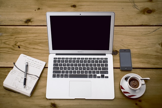 What my work looks like - except my coffee is much, much larger and the desk is, well, busier. 