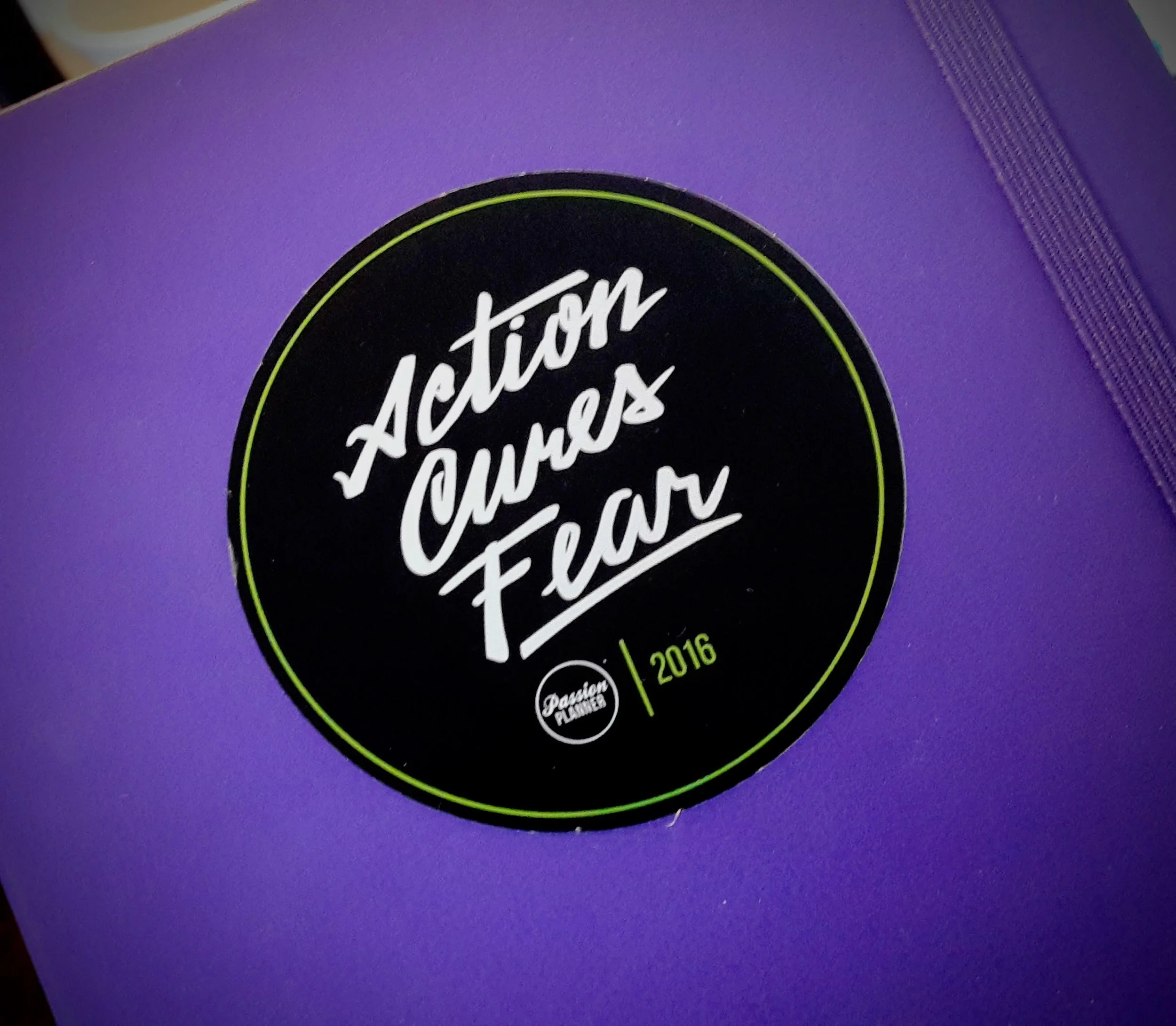 -The cover of my writing journal- with sticker from PassionPlanner . 