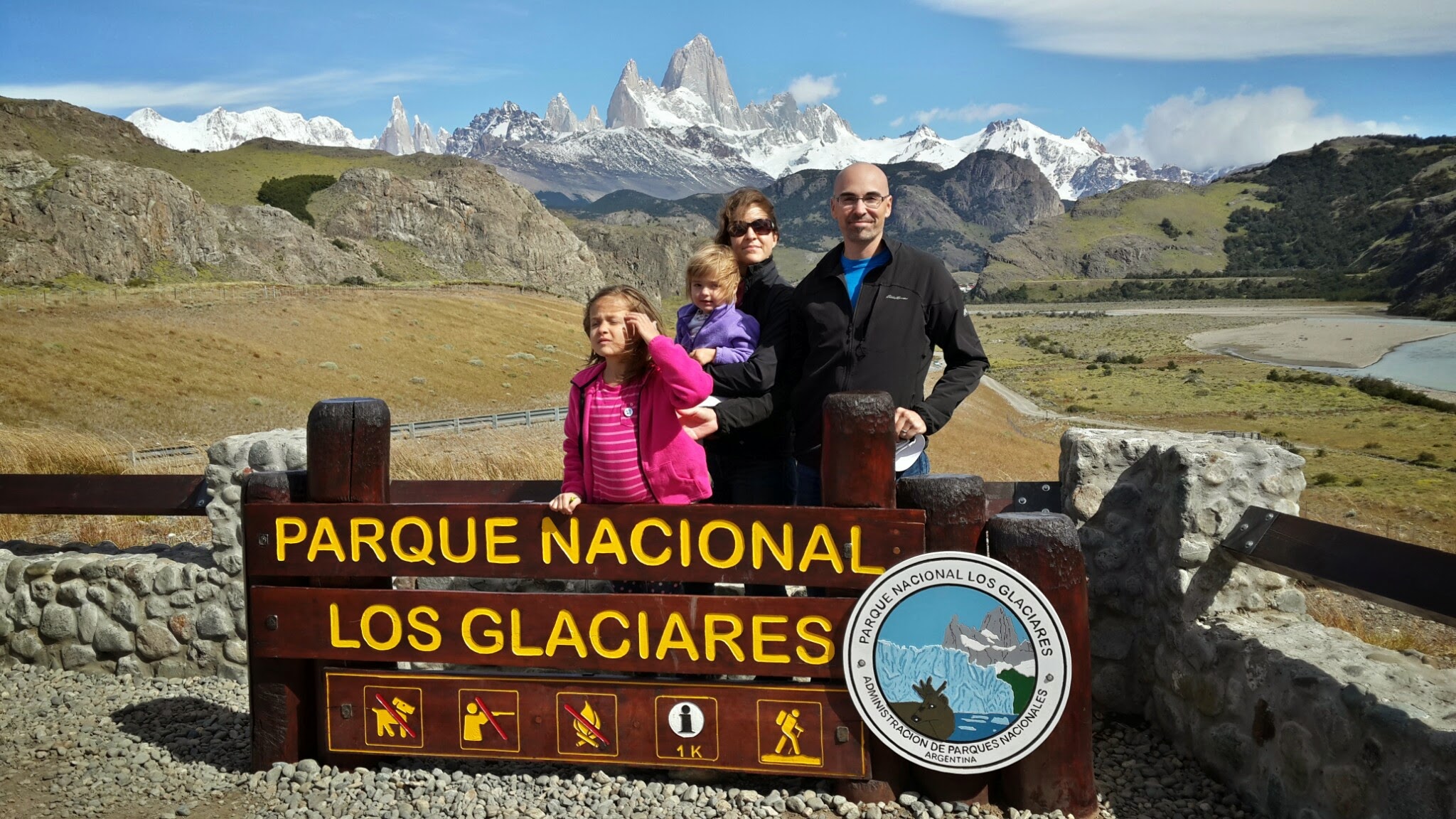 A real family photo in front of Mont Fitz Roy, near El Chaltén Argentina -- where a shaved head is a true advantage!