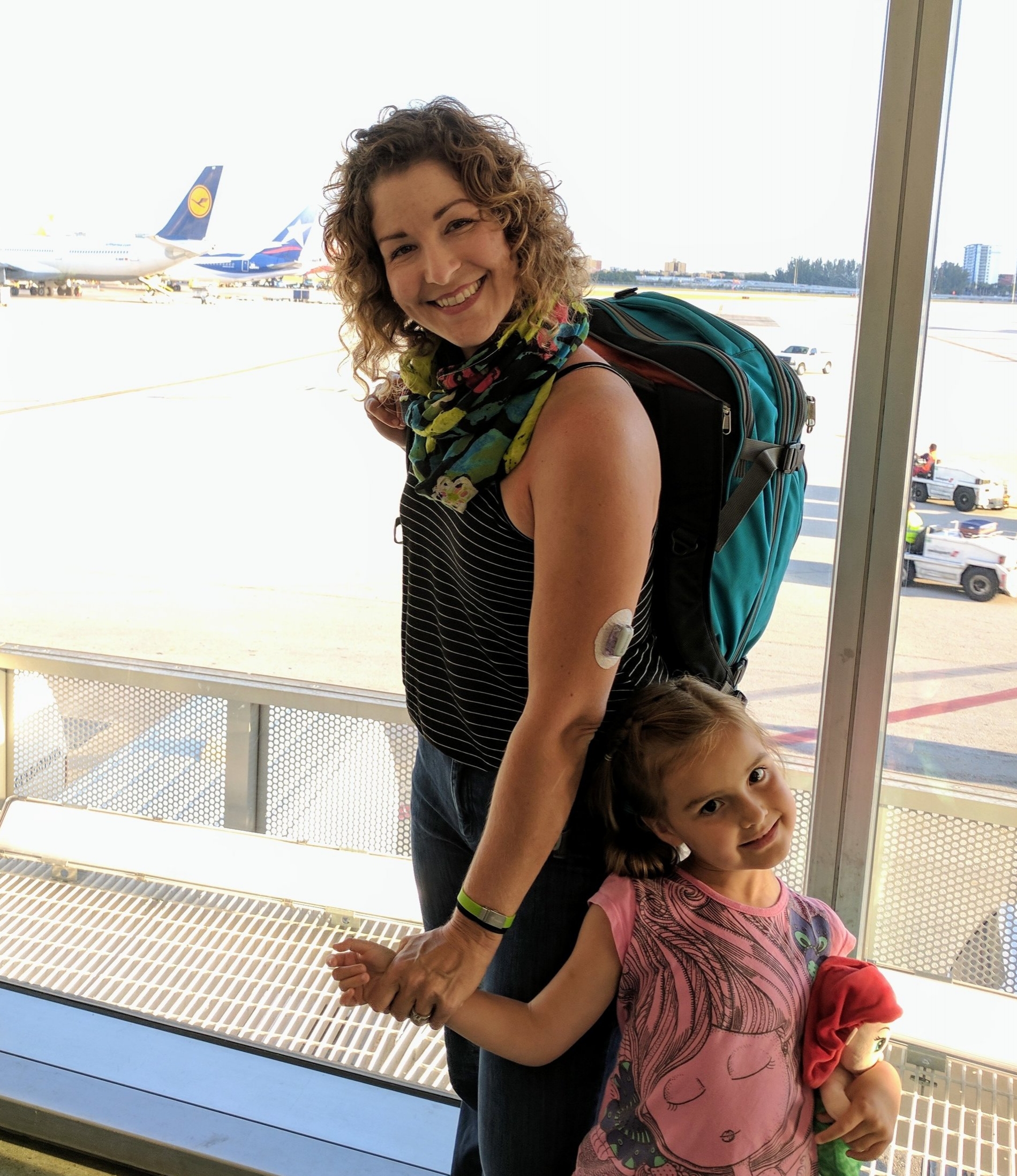 Me & F (almost 5!) on our way to Valencia, Spain. Showing off the continuous Glucose Monitor (CGM) on my arm for Type 1 Diabetes