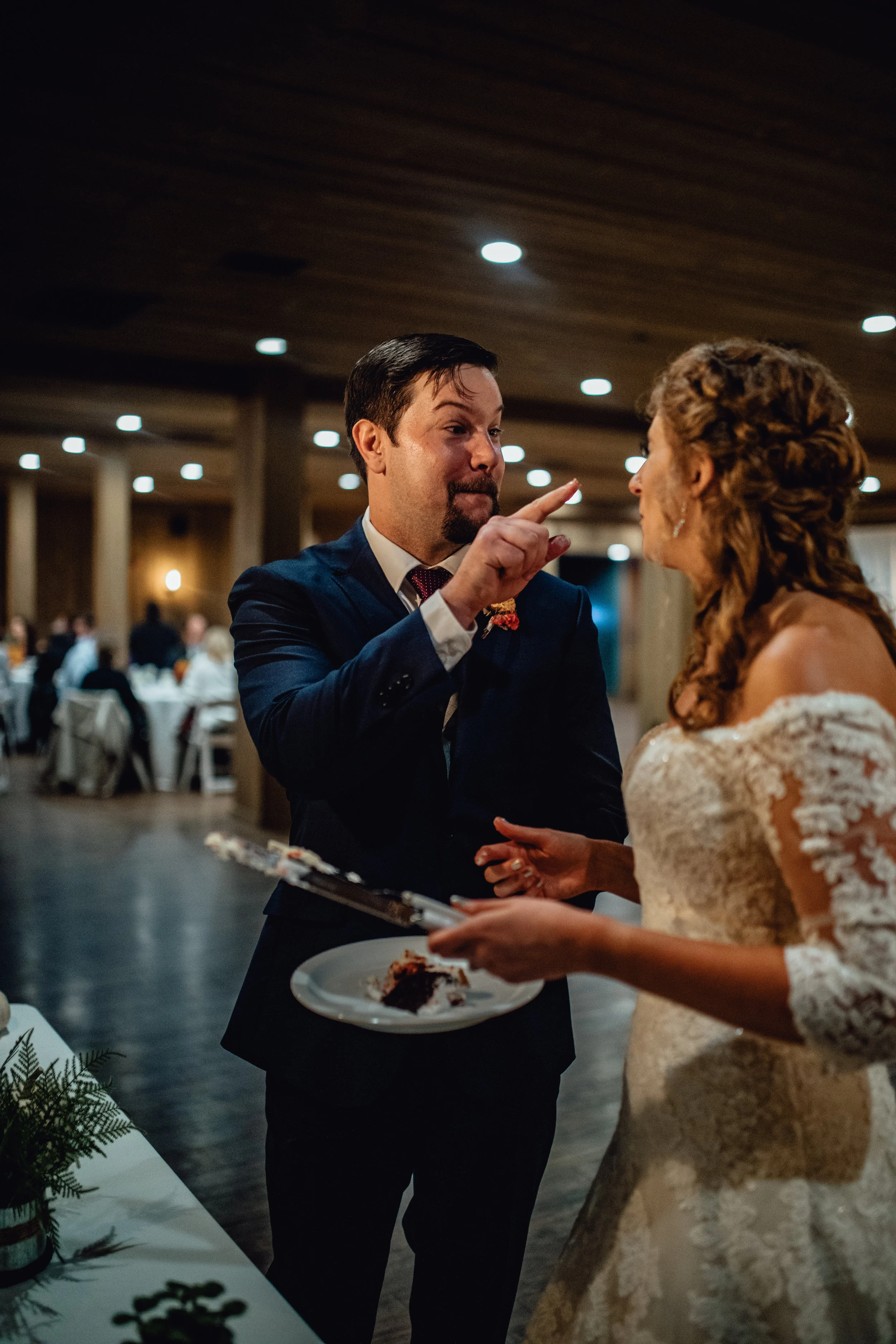 bride-and-groom-cutting-cake-at-rustic-manor-1848.jpg
