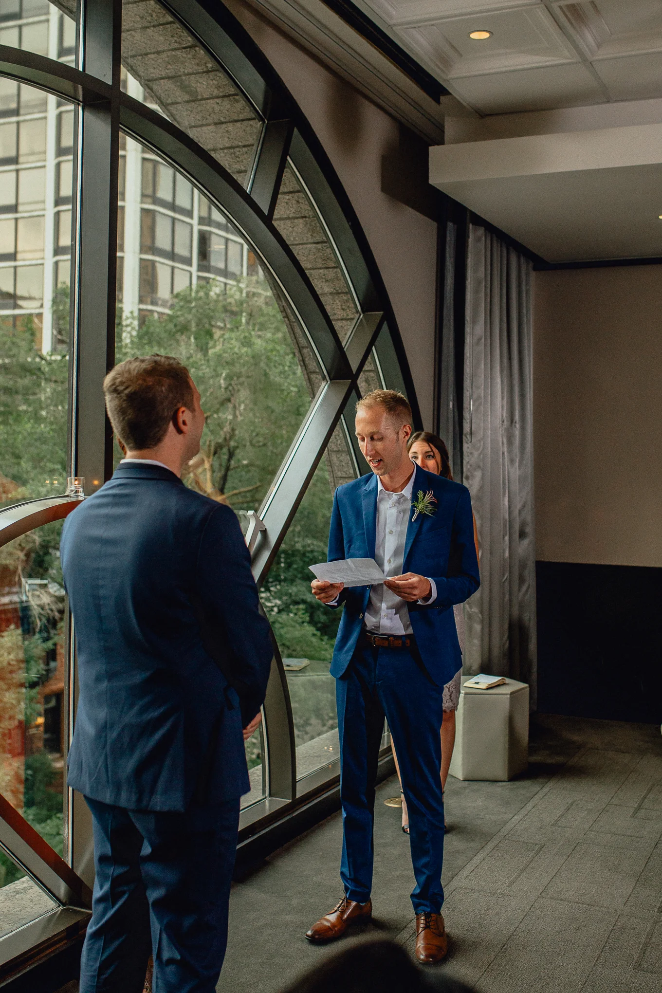 thompson-chicago-hotel-wedding-ceremony-reading-vows.jpg