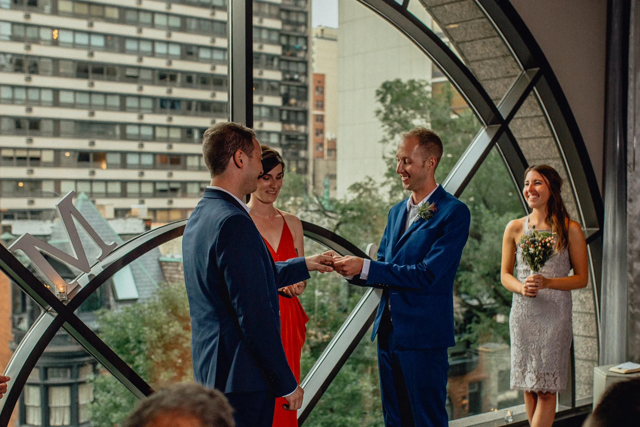 thompson-chicago-hotel-wedding-ceremony-exchanging-rings.jpg