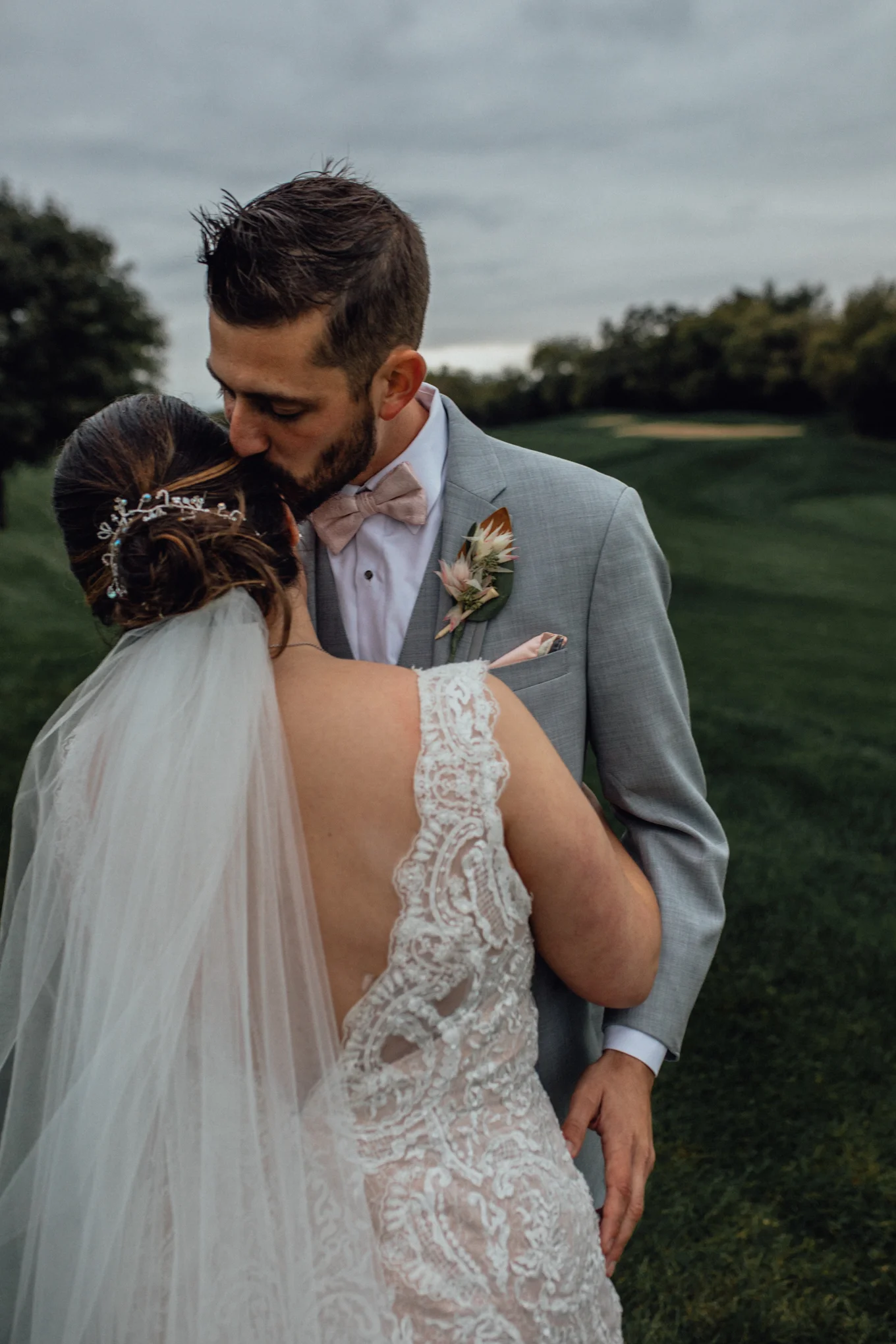 bride-and-groom-on-golf-course-at-brandybrook.jpg