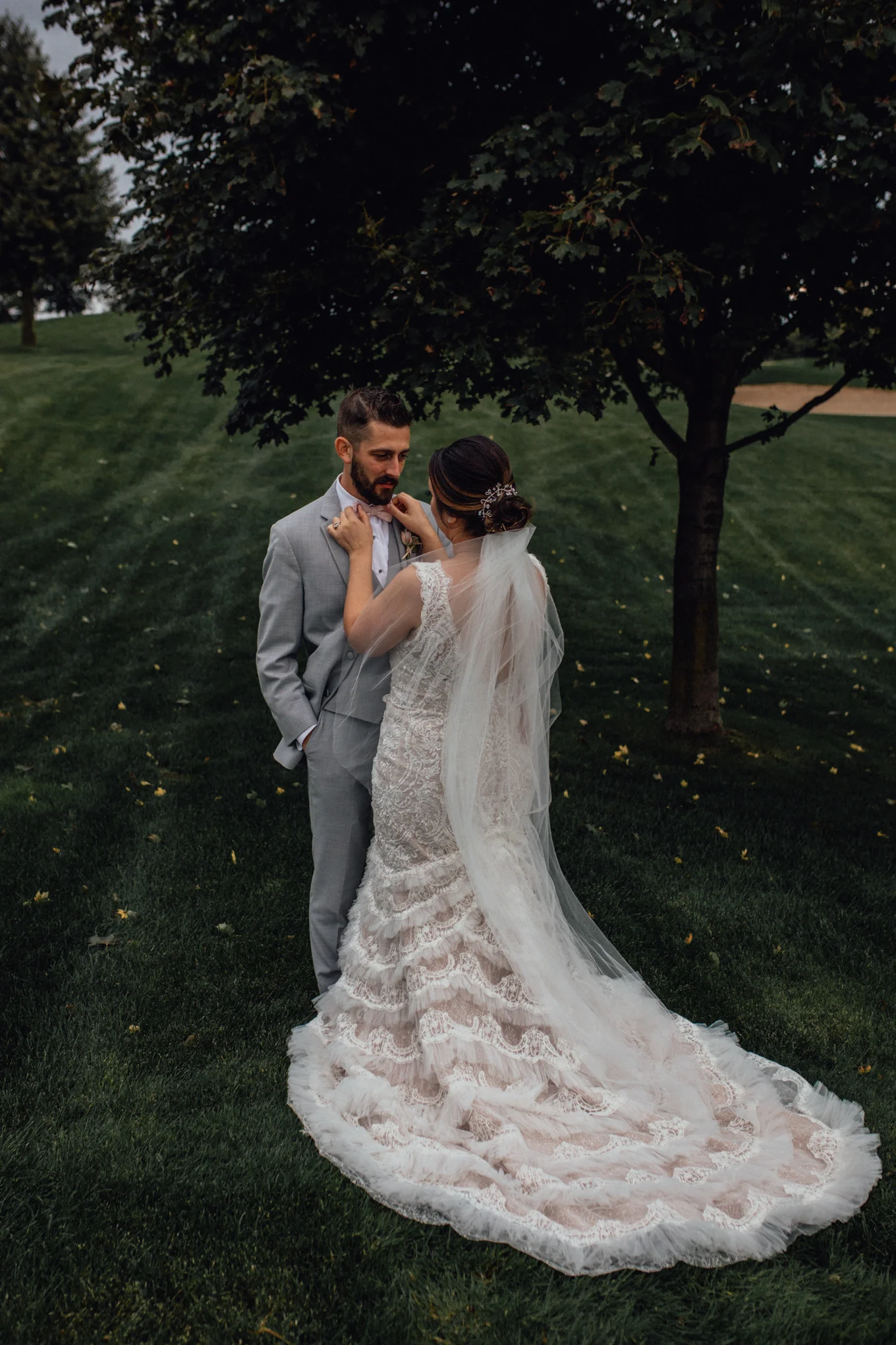 bride-and-groom-on-golf-course-at-brandybrook.jpg