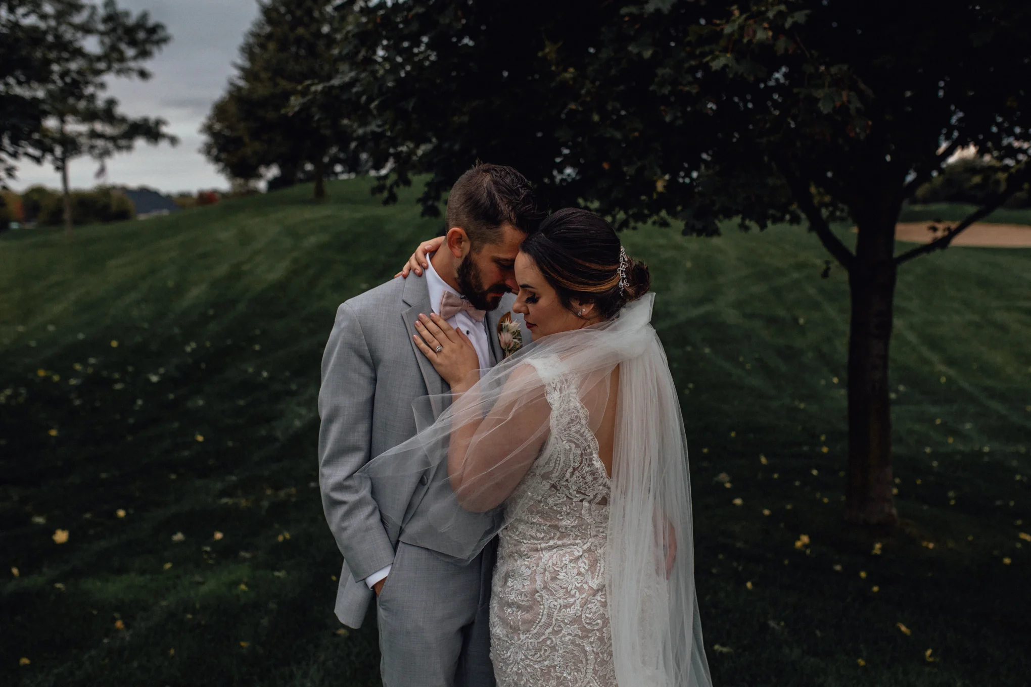 bride-and-groom-on-golf-course-at-brandybrook.jpg