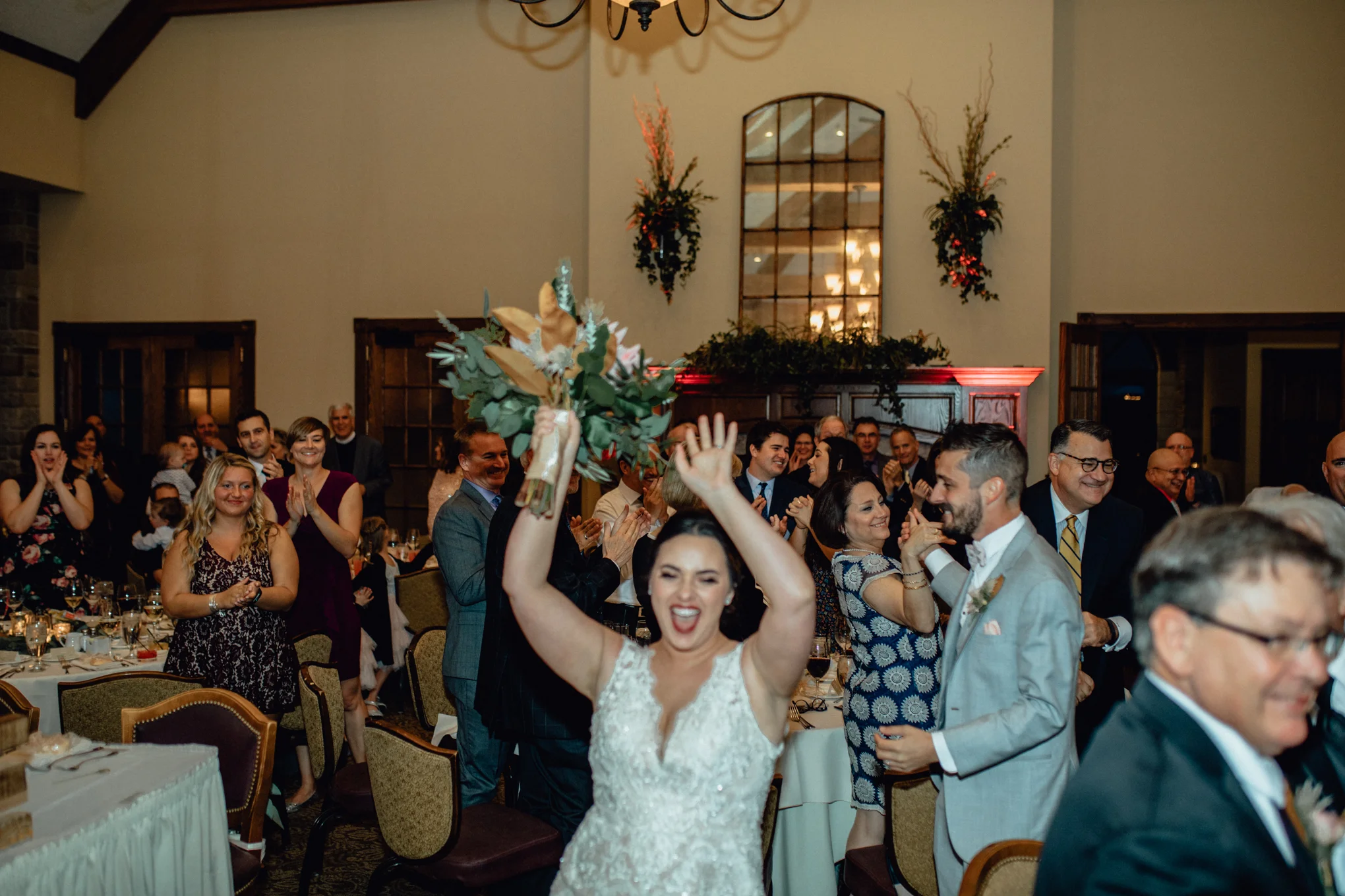 bride-and-groom-entering-wedding-reception.jpg