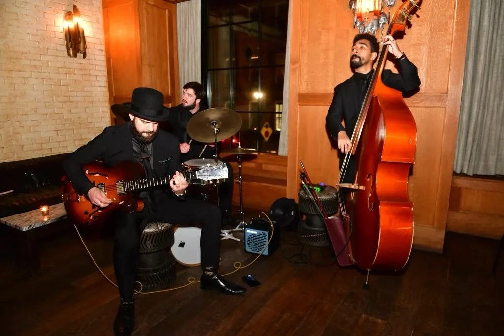 Jazz Guitar Trio Classy Birthday Celebration at a Classy Upscale French Bistro