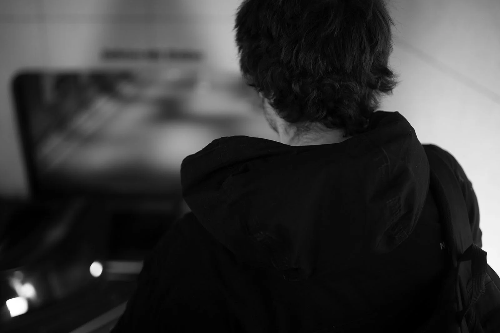 Kenyon travels 45 minutes each way to panhandle nearly every day. He uses an app on his phone to track different Metro lines. On average, Kenyon makes between five to sixty dollars a day.