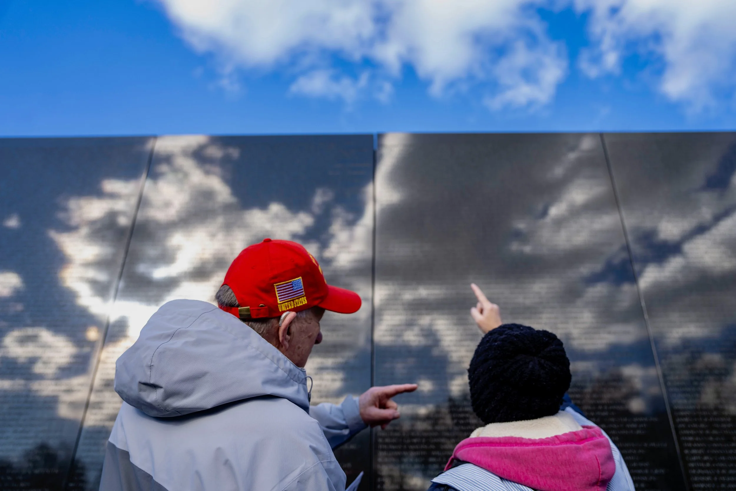  A couple looks for names along the Vietnam Veterans Memorial on Veterans Day in Washington, DC on Tuesday, November 11, 2025. 