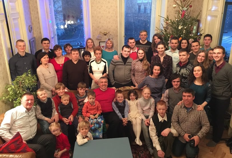 The Reformed Presbyterian Church of St. Petersburg celebrating Christmas and the fifth anniversary at the Purcell's. Pastor Oleg Volkov (front row, in the middle), elders Vlad Nebjhidovski (front row, right) and Alexander Firsanov (back row, at the right window) and all other members of this family.