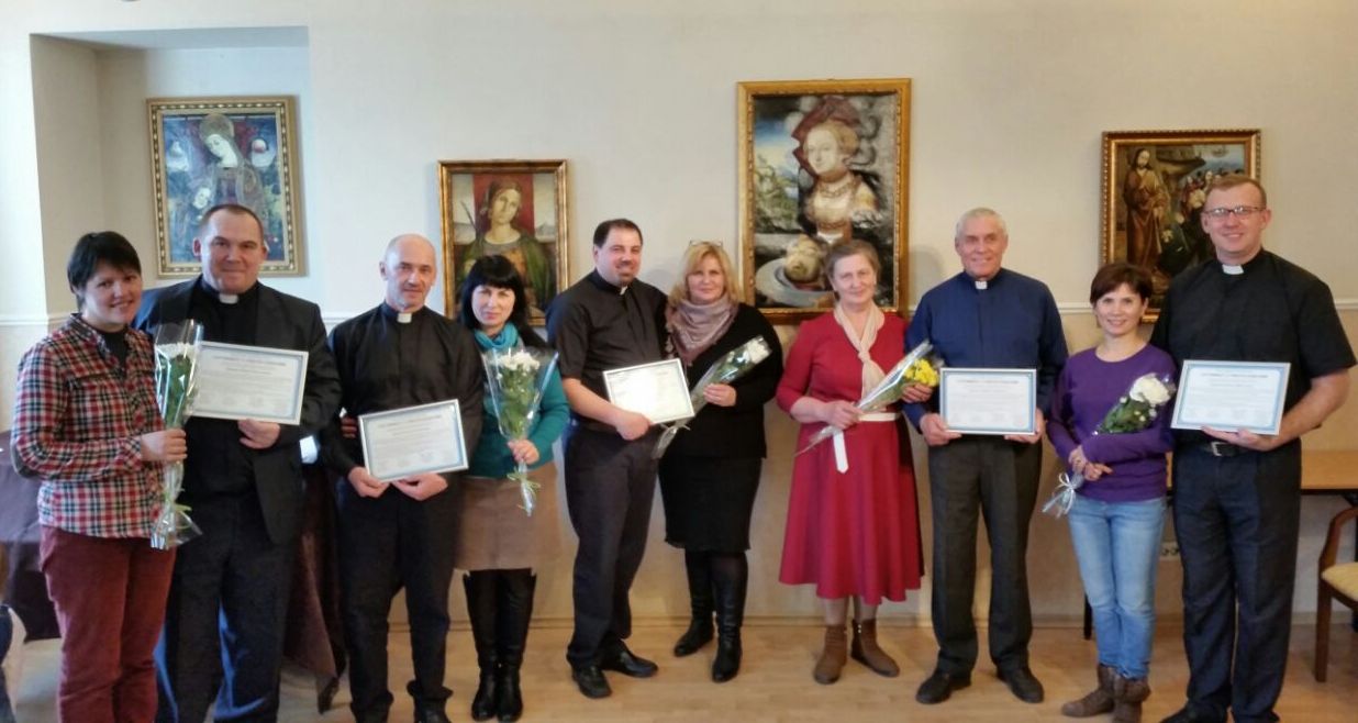 The pillars of the new presbytery with wives