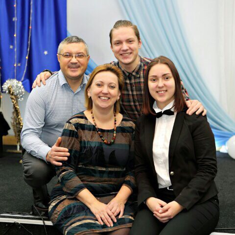 Andrey with his wife Tatyana, and son Egor and daughter Christina.jpg