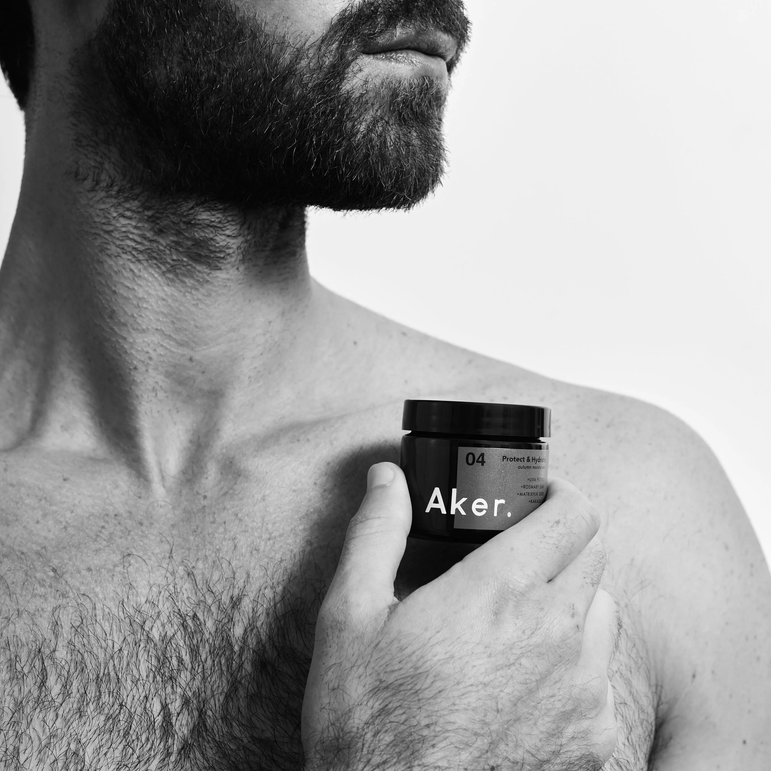 Aker Model Holding Autumn Topless.jpg