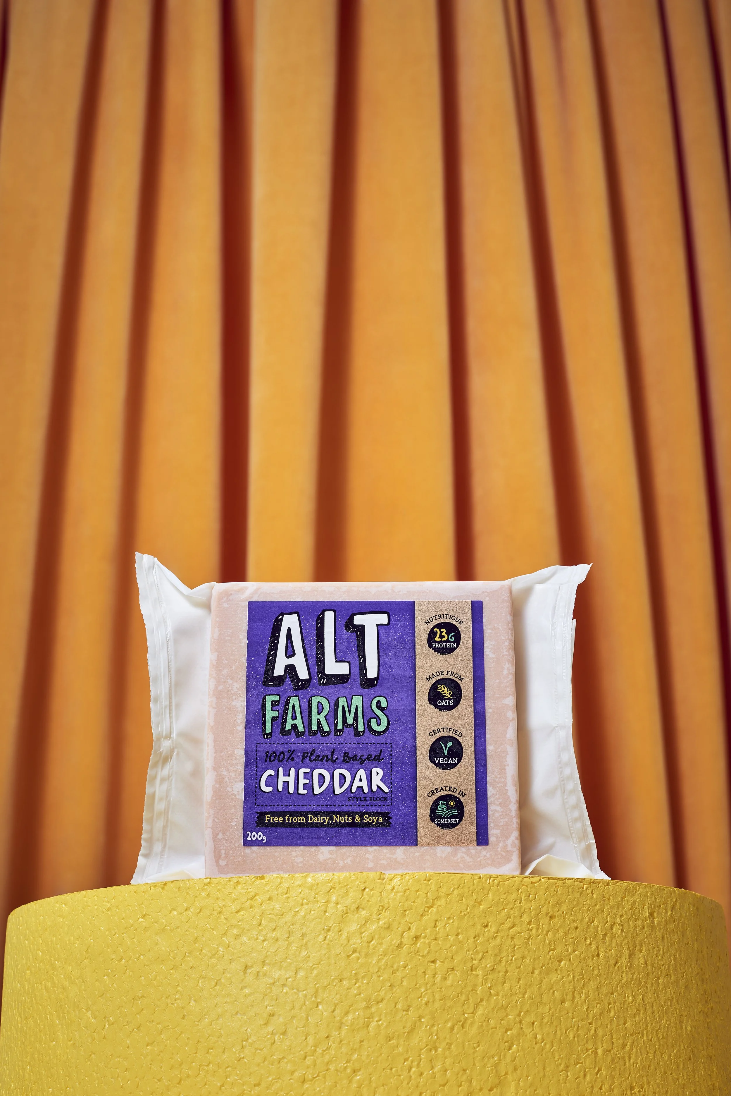 Alt_Farms_Cheese_On_Pedestal_Curtain.jpg