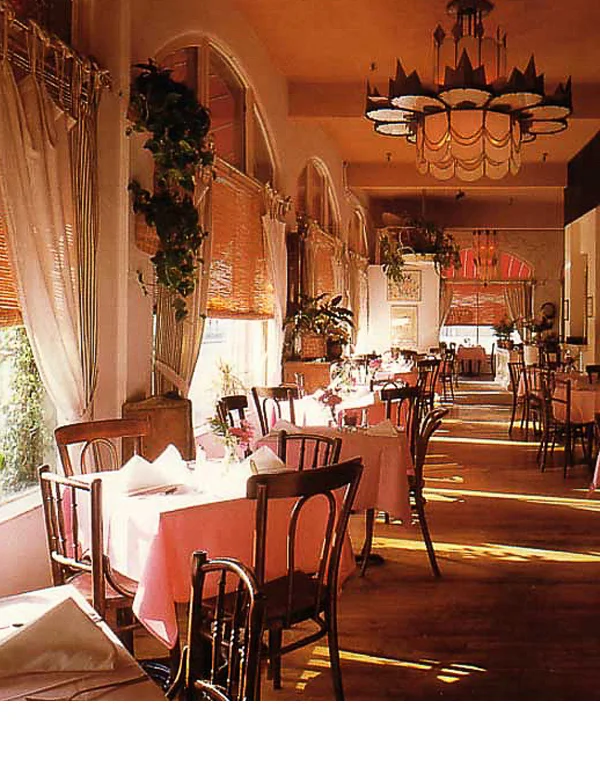 Restaurant adorned with old deco theater fixtures and broken mirror walls, inspired the hotel renovation. 