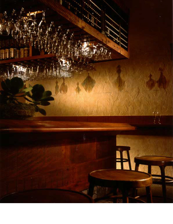  Old timbers were used in remodeling the bar and bottles rendered in egg tempura. 